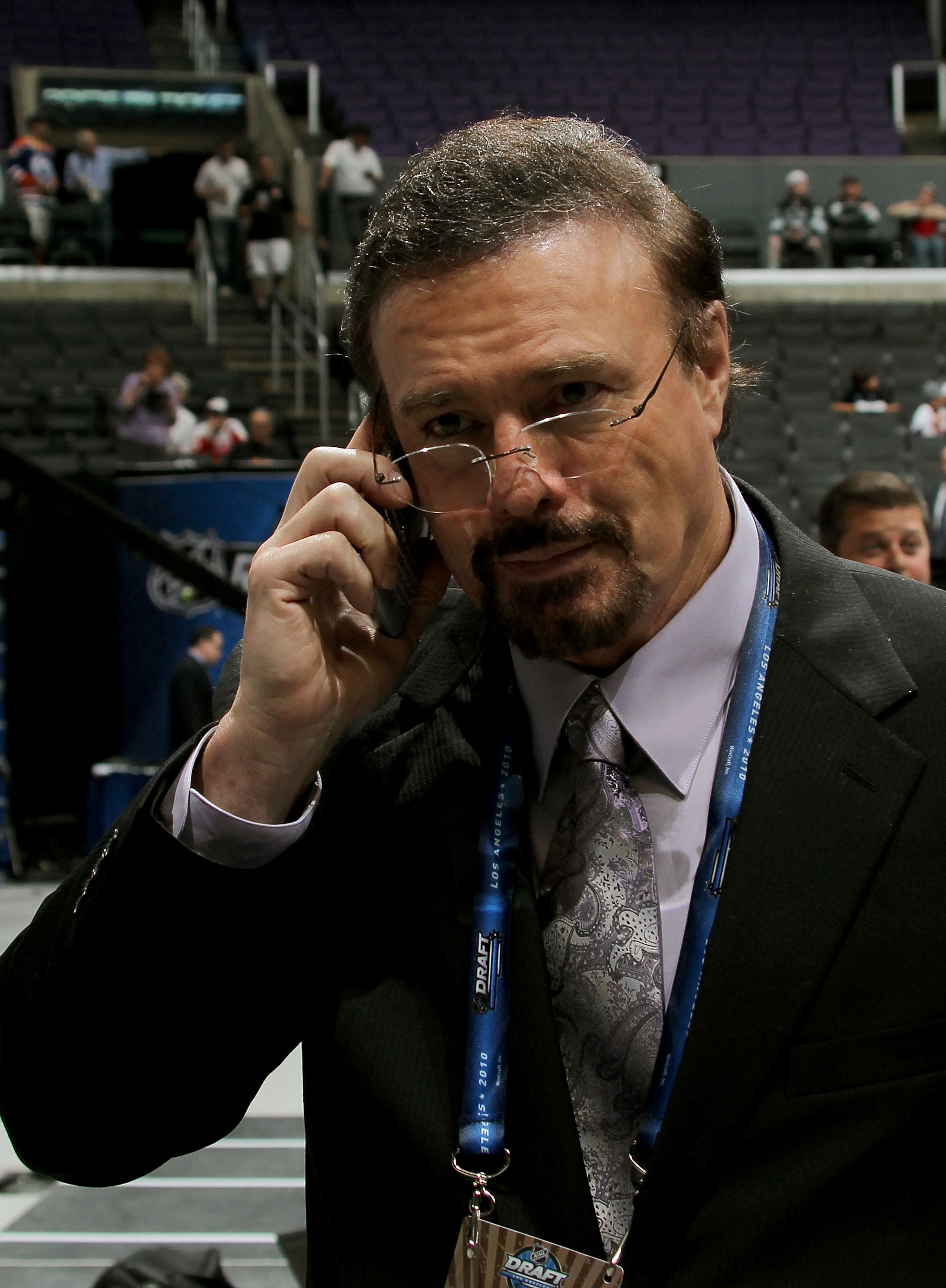 LOS ANGELES, CA - JUNE 25:  General Manager Rick Dudley of the Atlanta Thrashers speaks on the phone during the 2010 NHL Entry Draft at Staples Center on June 25, 2010 in Los Angeles, California.  (Photo by Bruce Bennett/Getty Images)