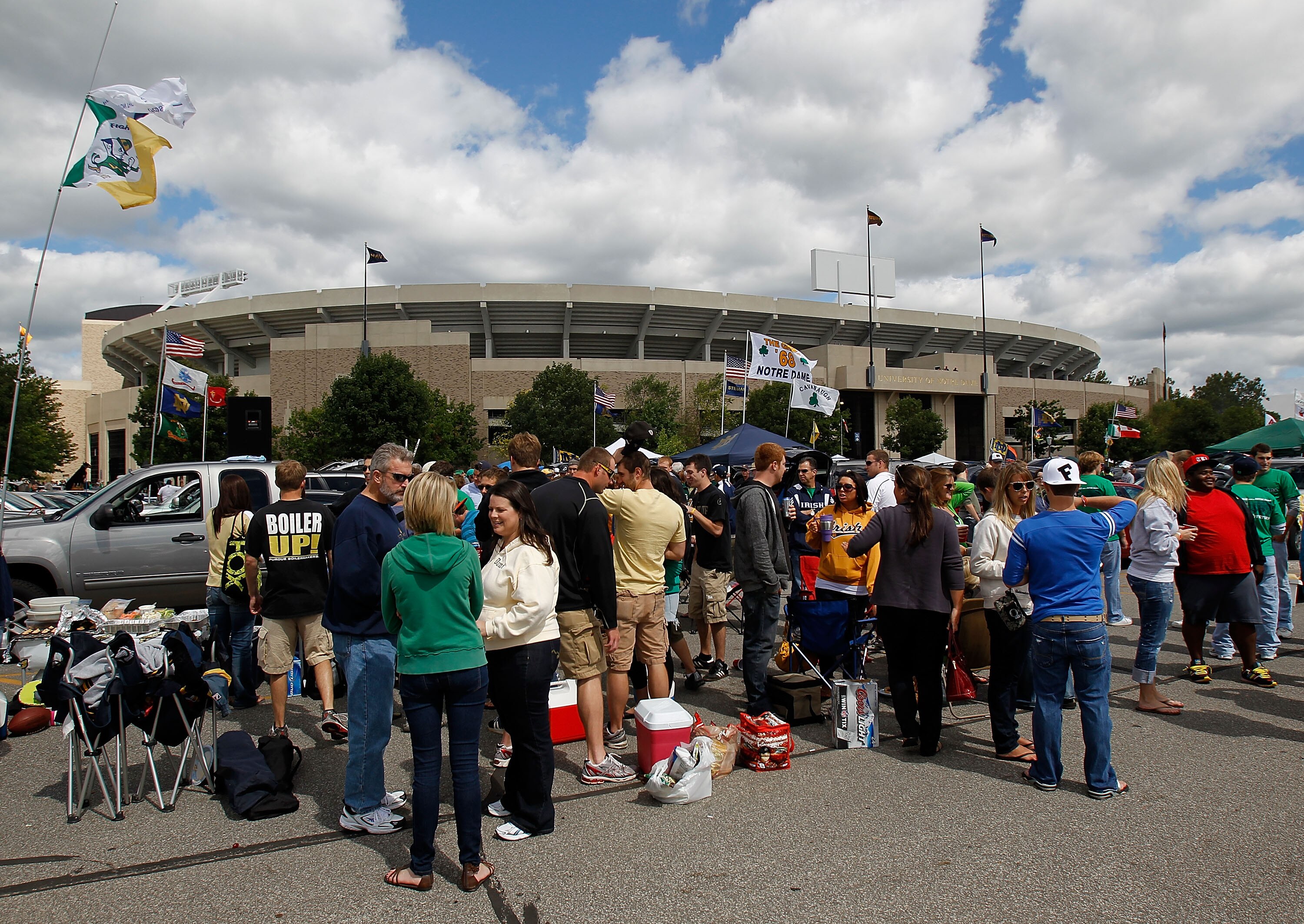 SOUTH BEND, IN - SEPTEMBER 04: Fans tailgate outside of Notre Dame Stadium before a game between the Notre Dame Fighting Irish and the Purdue Boilermakers at Notre Dame Stadium on September 4, 2010 in South Bend, Indiana. (Photo by Jonathan Daniel/Getty I SOUTH BEND, IN - SEPTEMBER 04: Fans tailgate outside of Notre Dame Stadium before a game between the Notre Dame Fighting Irish and the Purdue Boilermakers at Notre Dame Stadium on September 4, 2010 in South Bend, Indiana. (Photo by Jonathan Daniel/Getty I