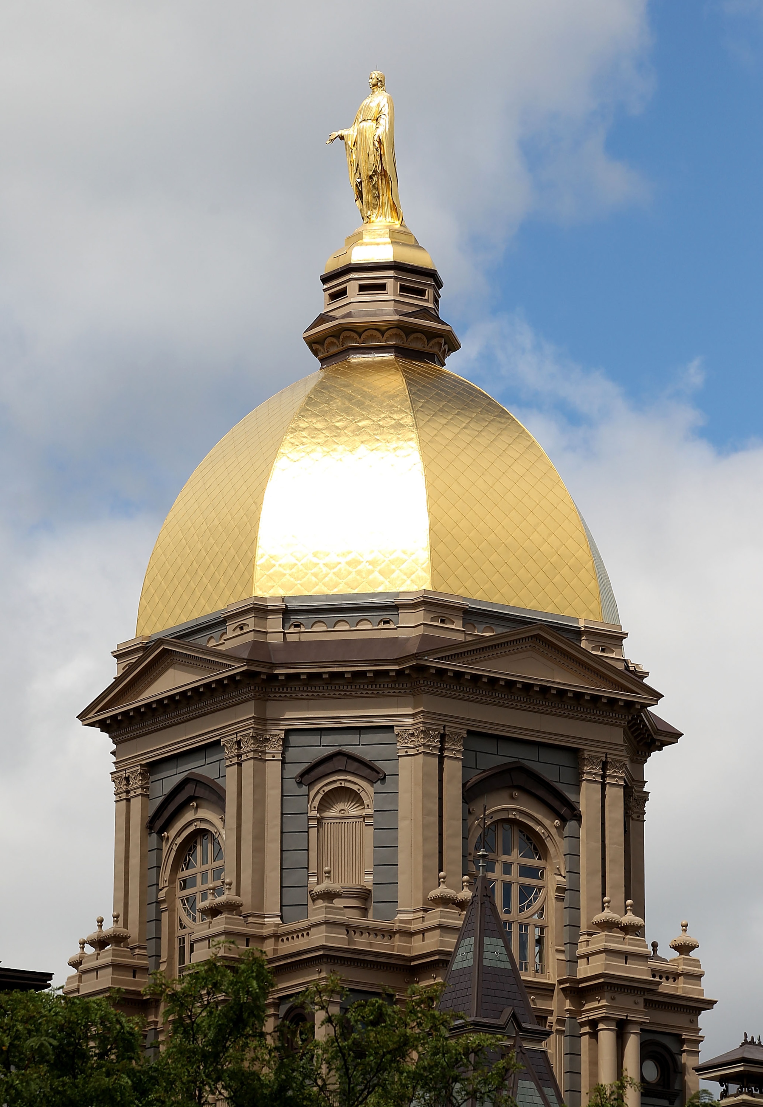 SOUTH BEND, IN - SEPTEMBER 04: The 'Golden Dome' is seen on the campus of Notre Dame University before a game between the Notre Dame Fighting Irish and the Purdue Boilermakers at Notre Dame Stadium on September 4, 2010 in South Bend, Indiana. (Photo by Jo