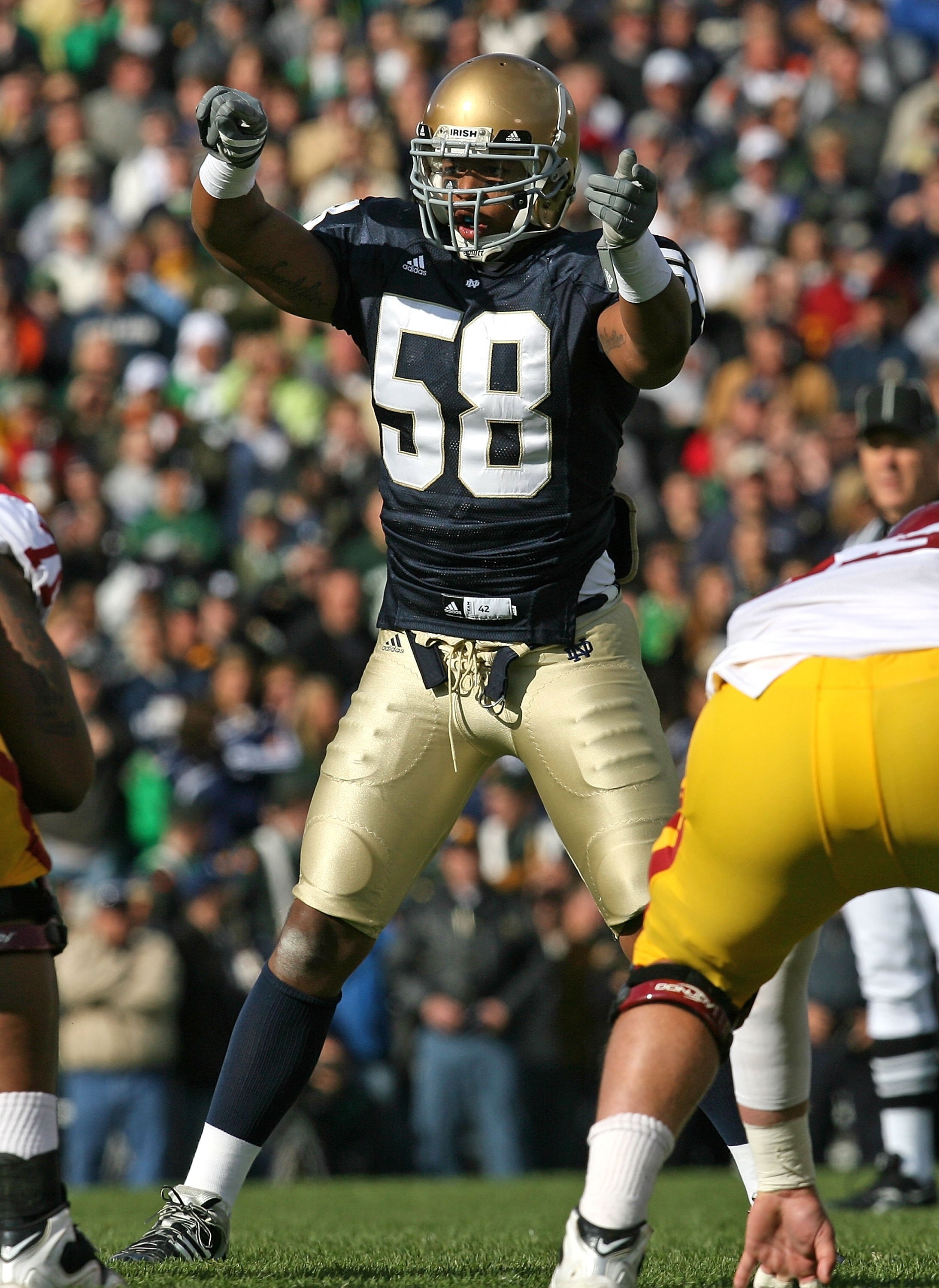 SOUTH BEND, IN - OCTOBER 17: Brian Smith #58 of the Notre Dame Fighting Irish gives defensive signals against the USC Trojans at Notre Dame Stadium on October 17, 2009 in South Bend, Indiana. USC defeated Notre Dame 34-27. (Photo by Jonathan Daniel/Getty SOUTH BEND, IN - OCTOBER 17: Brian Smith #58 of the Notre Dame Fighting Irish gives defensive signals against the USC Trojans at Notre Dame Stadium on October 17, 2009 in South Bend, Indiana. USC defeated Notre Dame 34-27. (Photo by Jonathan Daniel/Getty