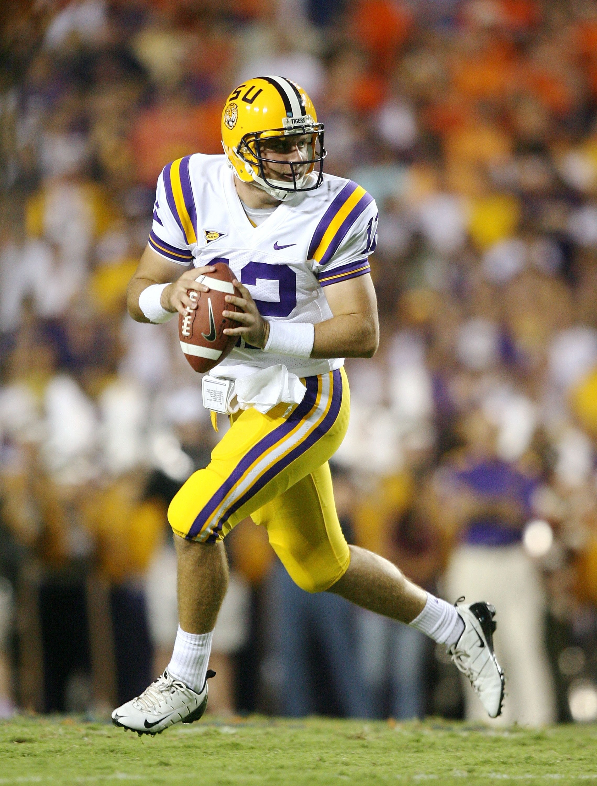 AUBURN, AL - SEPTEMBER 20:  Quarterback Jarrett Lee #12 of the LSU Tigers rolls out to pass against the Auburn Tigers at Jordan-Hare Stadium on September 20, 2008 in Auburn, Alabama. LSU defeated Auburn 26-21.  (Photo by Doug Benc/Getty Images)