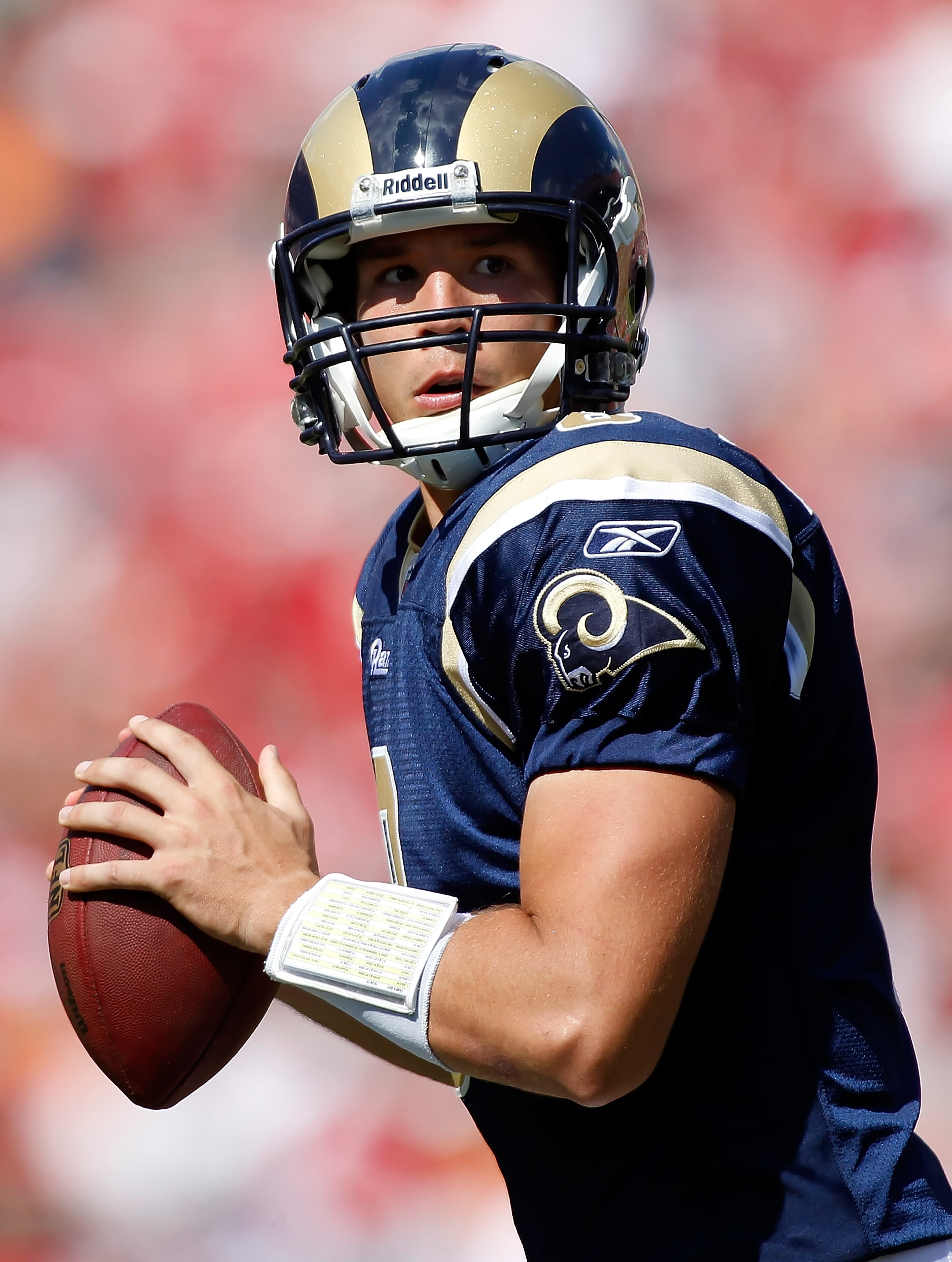 TAMPA, FL - OCTOBER 24:  Quarterback Sam Bradford #8 of the St. Louis Rams looks for an open receiver against the Tampa Bay Buccaneers during the game at Raymond James Stadium on October 24, 2010 in Tampa, Florida.  (Photo by J. Meric/Getty Images)