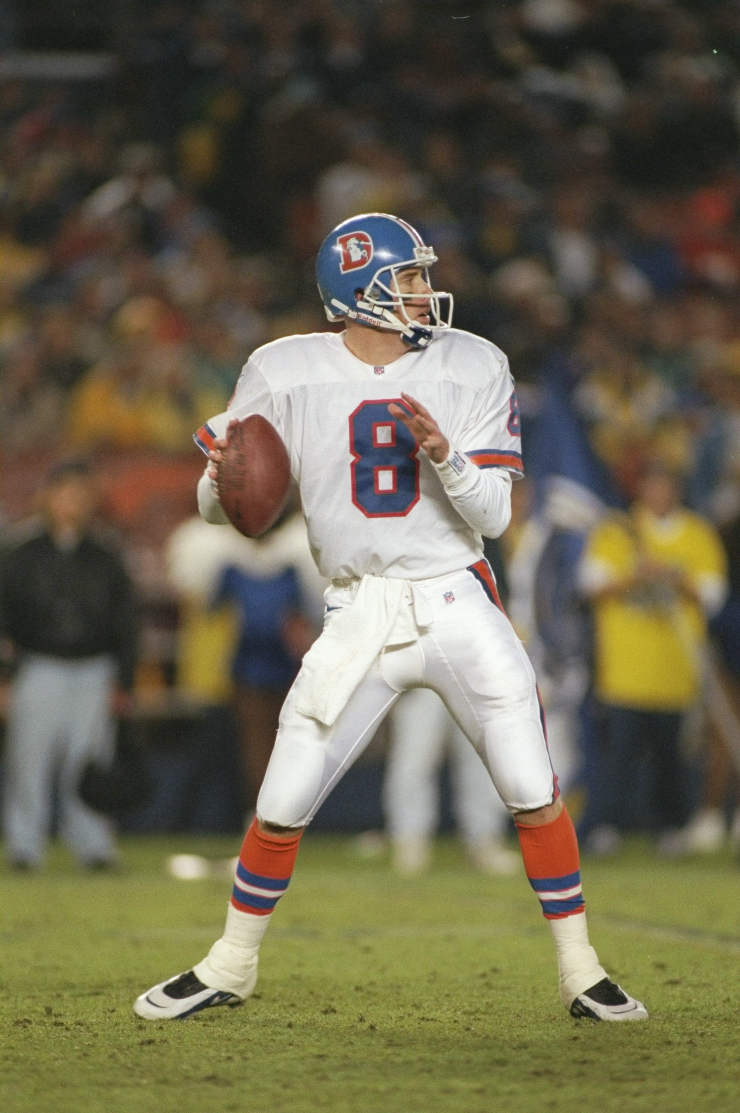 22 Dec 1996: Quarterback Jeff Lewis of the Denver Broncos drops back to pass during a game against the San Diego Chargers at Jack Murphy Stadium in San Diego, California. The Chargers won the game 16-10.