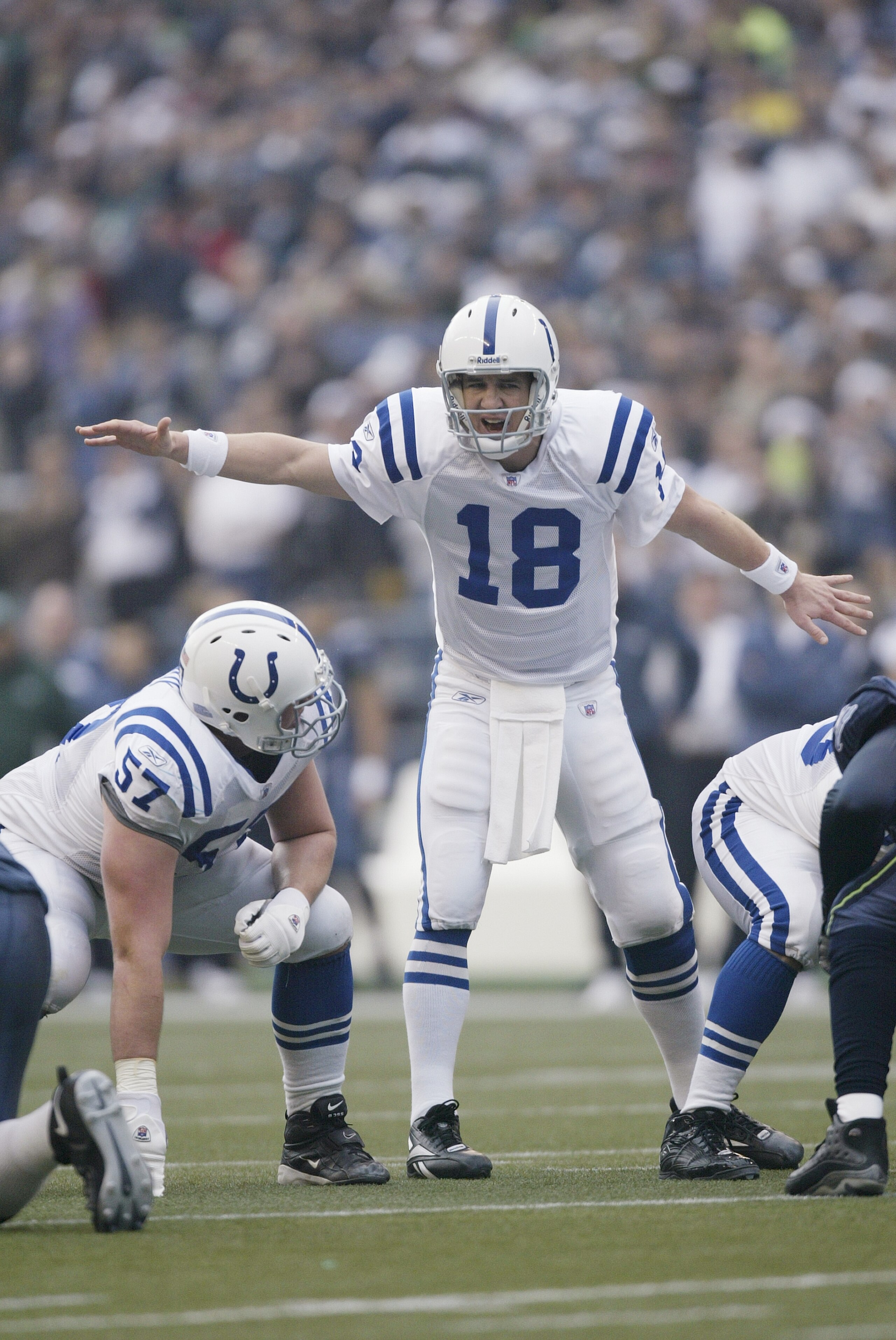 SEATTLE - DECEMBER 24:  Quarterback Peyton Manning #18 of the Indianapolis Colts calls out signals against the Seattle Seahawks at Qwest Field on December 24, 2005 in Seattle, Washington. The Seahawks defeated the Colts 28-13.  (Photo by Otto Greule Jr/Ge