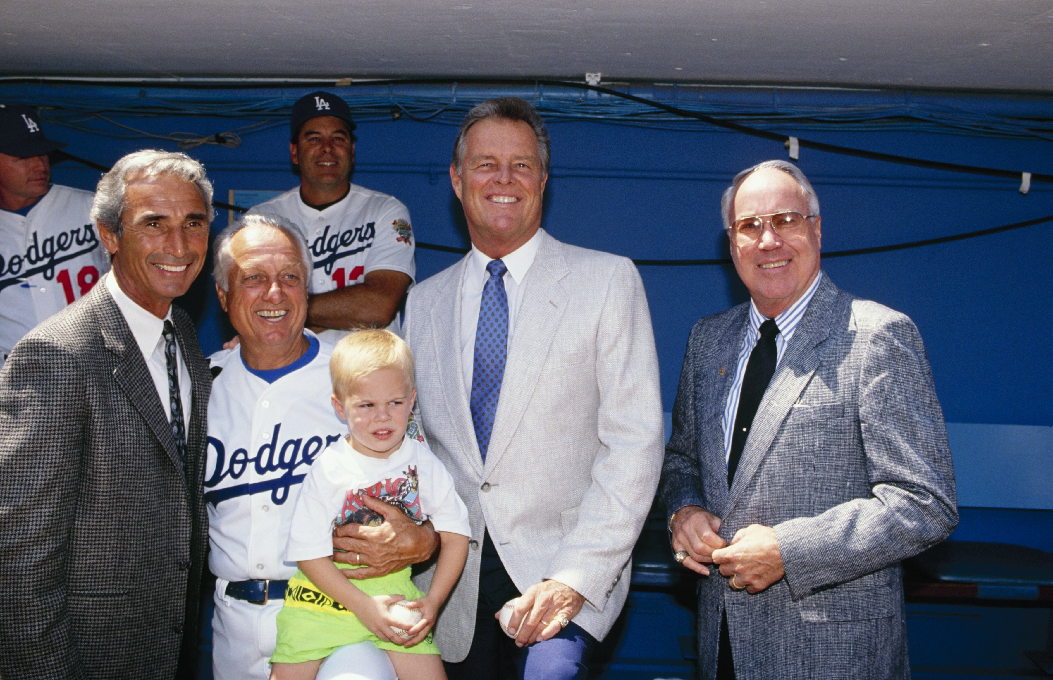 LOS ANGELES - 1990:  (L-R) Sandy Koufax, Tommy Lasorda, Don Drysdale and Duke Snider pose for a photo before a Los Angeles Dodgers game in the 1990 season at Dodger Stadium in Los Angeles, California. (Photo by Ken Levine/Getty Images)