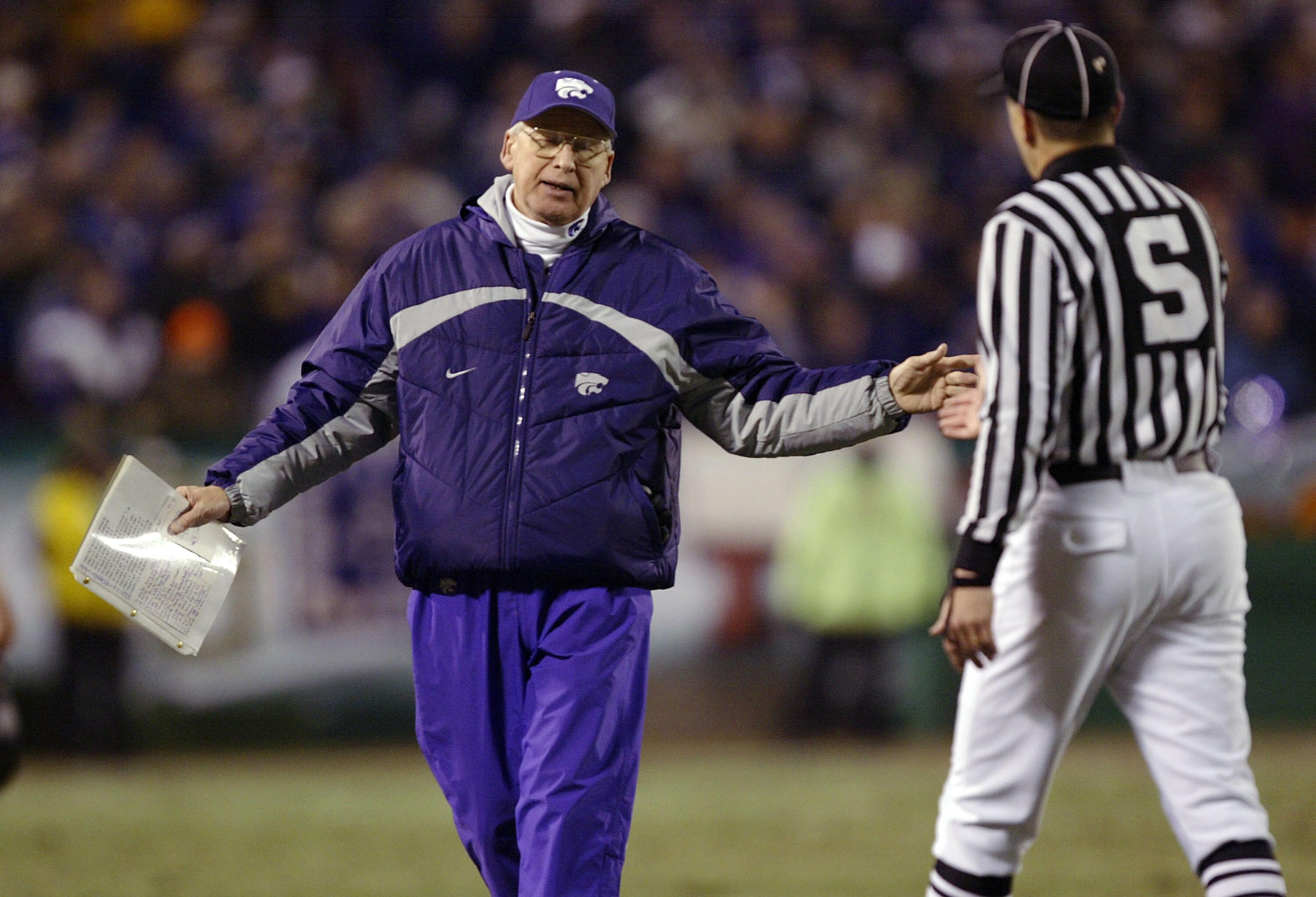 KANSAS CITY, MO - DECEMBER 6:  Head coach Bill Synder of the Kansas State Wildcats questions a sideline judge after an interference penalty in favor of the Oklahoma Sooners during the second quarter of the Dr. Pepper Big 12 Championship December 6, 2003 a