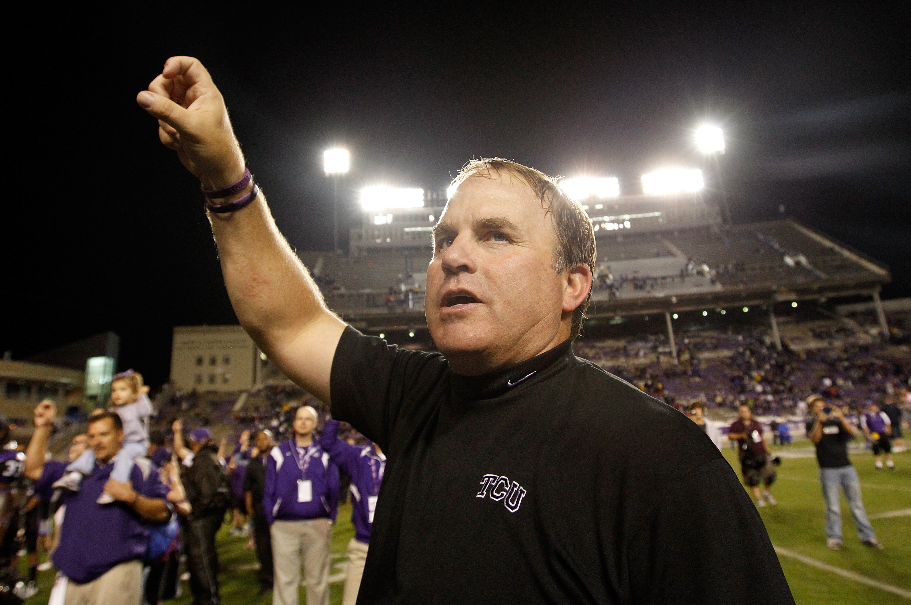 FORT WORTH, TX - OCTOBER 23:  Head coach Gary Patterson of the TCU Horned Frogs celebrates on the field after TCU beat the Air Force Falcons 38-7 at Amon G. Carter Stadium on October 23, 2010 in Fort Worth, Texas.  (Photo by Tom Pennington/Getty Images)