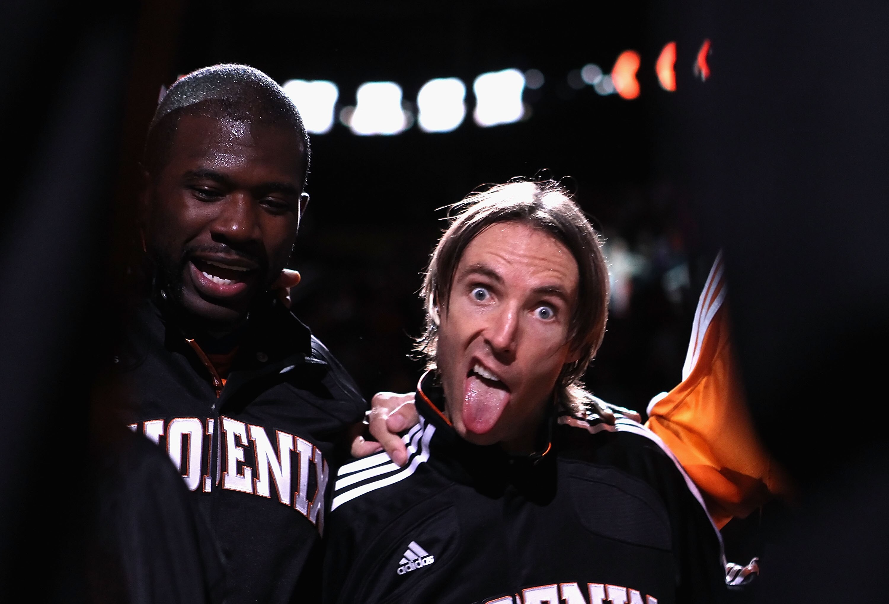 PHOENIX - OCTOBER 22:  Steve Nash #13 of the Phoenix Suns makes a funny face while huddled up with teammates before the preseason NBA game against the Denver Nuggets at US Airways Center on October 22, 2010 in Phoenix, Arizona. NOTE TO USER: User expressl