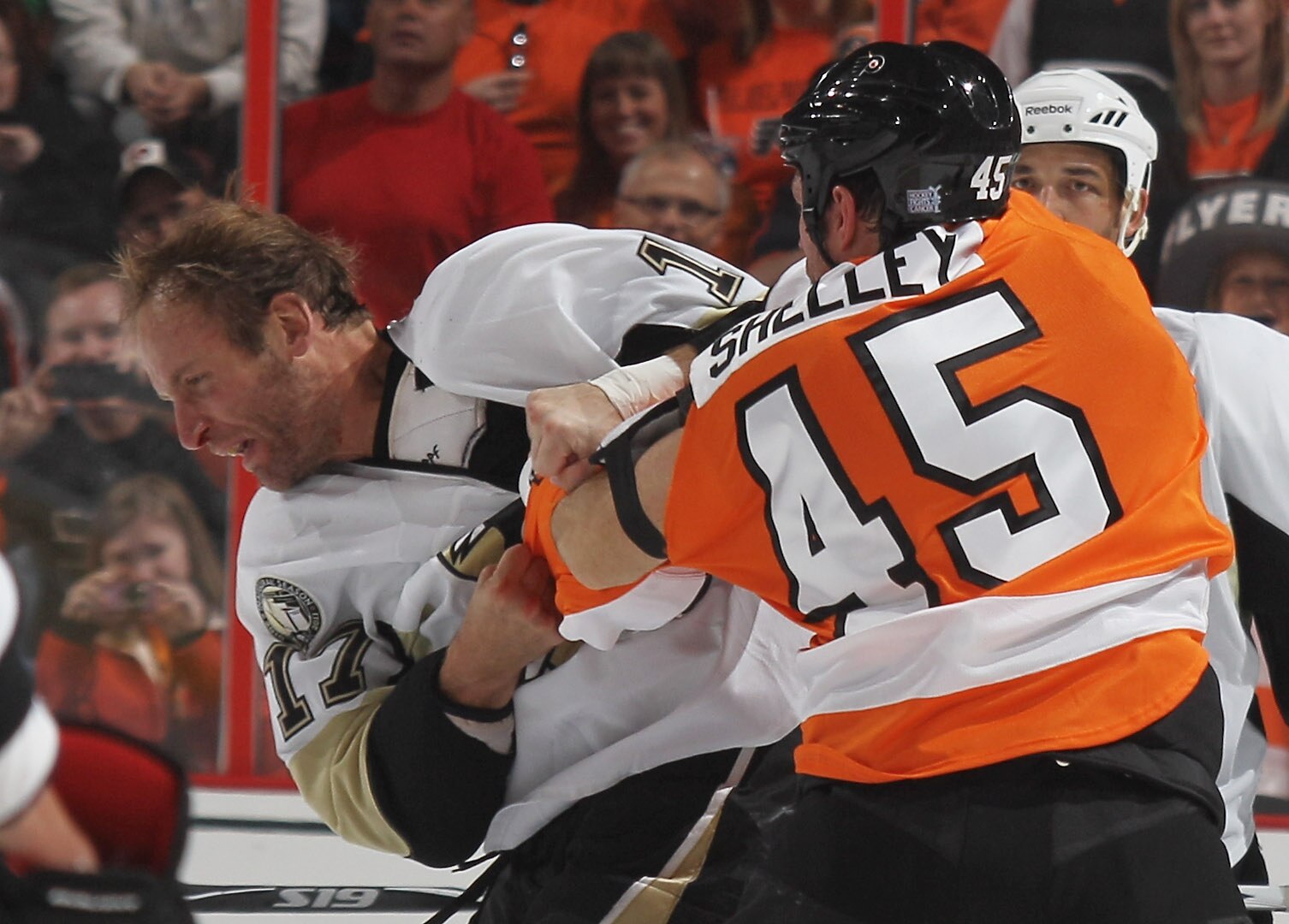 PHILADELPHIA - OCTOBER 16: Michael Rupp #17 of the Pittsburgh Penguins fights with Jody Shelley #45 of the Philadelphia Flyers at the Wells Fargo Center on October 16, 2010 in Philadelphia, Pennsylvania.  The Penguins defeated the Flyers 5-1. (Photo by Br