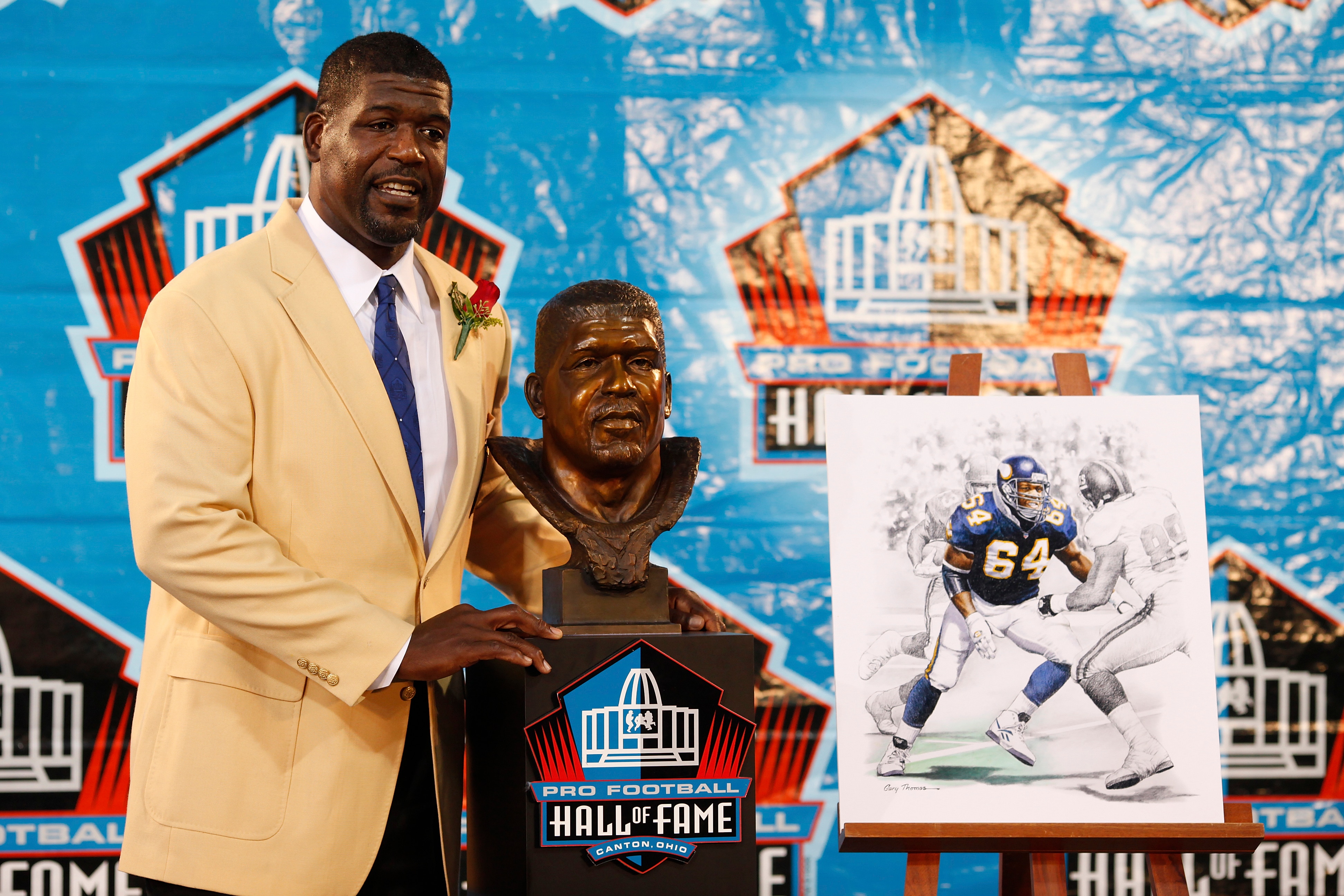 CANTON, OH - AUGUST 8: Randall McDaniel poses with his bust at his induction into the Pro Football Hall of Fame during the 2009 enshrinement ceremony at Fawcett Stadium on August 8, 2009 in Canton, Ohio. (Photo by Joe Robbins/Getty Images)