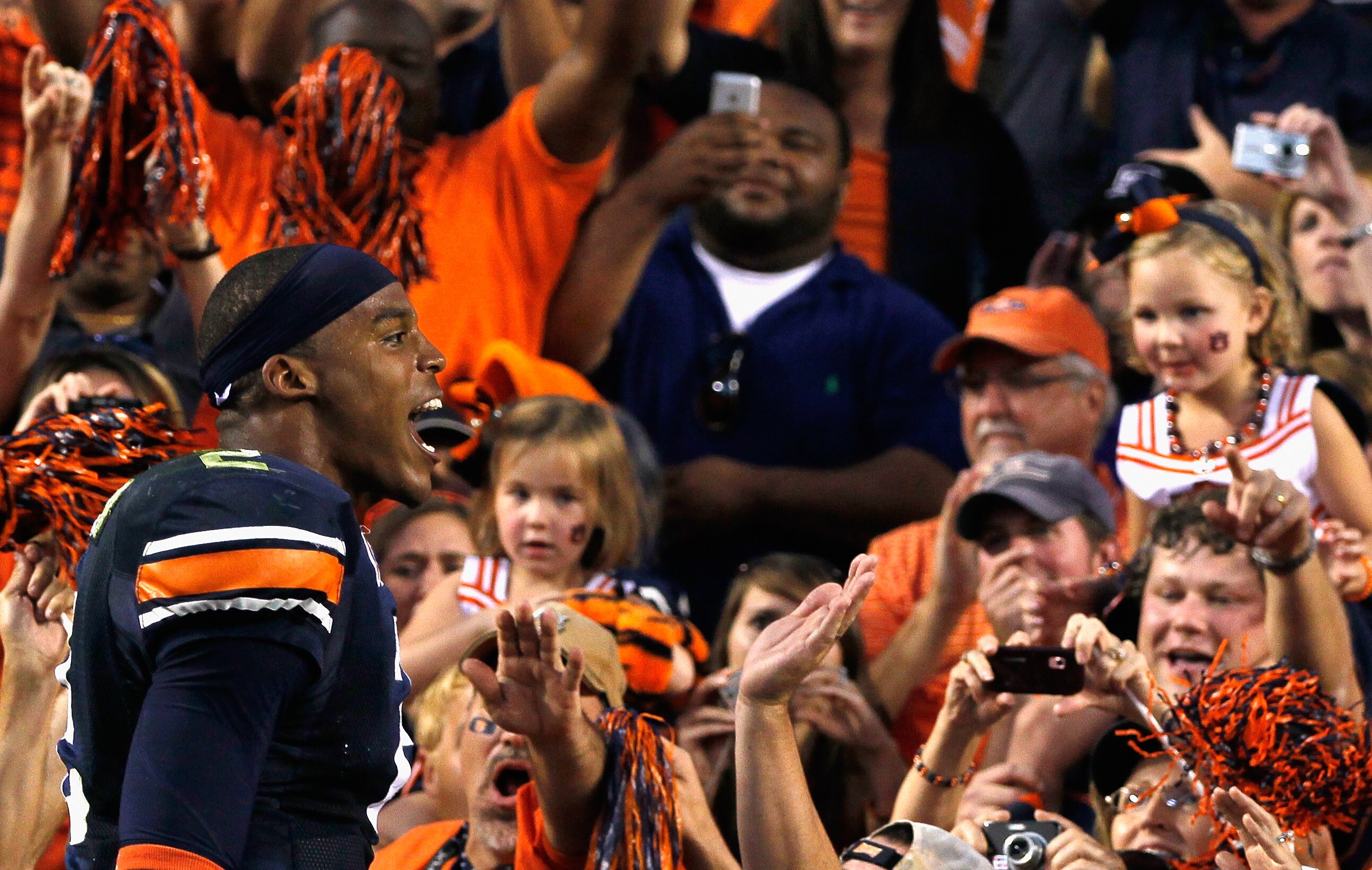 AUBURN, AL - OCTOBER 23:  Quarterback Cameron Newton #2 of the Auburn Tigers celebrates with the fans after their 24-17 over the LSU Tigers at Jordan-Hare Stadium on October 23, 2010 in Auburn, Alabama.  (Photo by Kevin C. Cox/Getty Images)