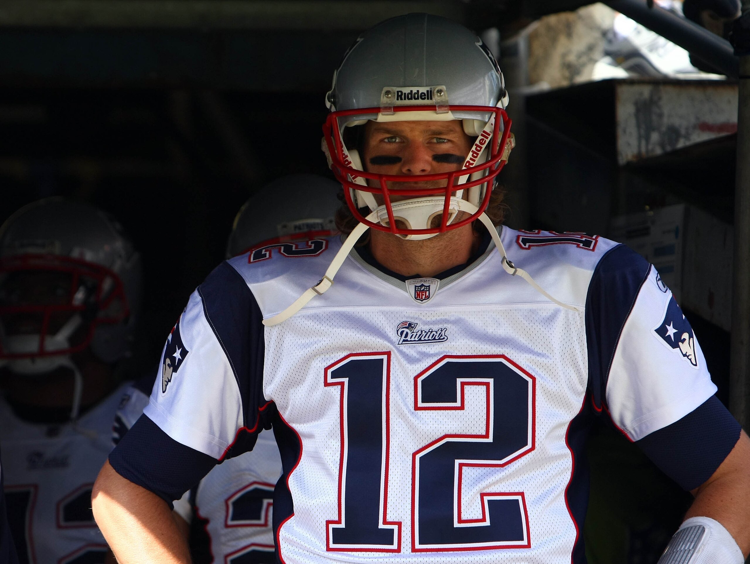SAN DIEGO - OCTOBER 24:  Quarterback Tom Brady #12 of the New England prepares to enter the game against the San Diego Chargers during their NFL game on October 24, 2010 at Qualcomm Stadium in San Diego, California. (Photo by Donald Miralle/Getty Images)