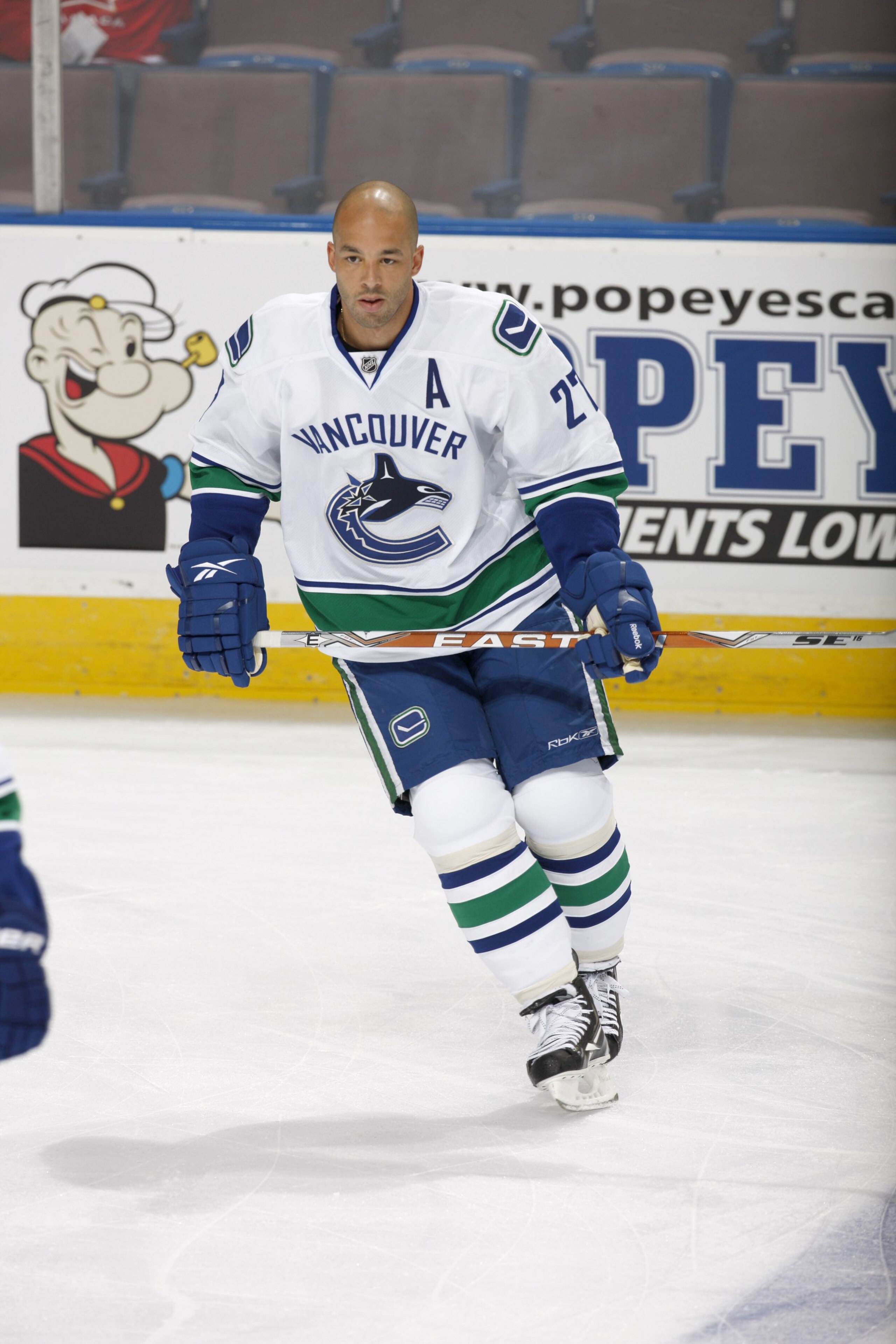 EDMONTON, CANADA - SEPTEMBER 26: Manny Malhotra #27 of the Vancouver Canucks skates against the Edmonton Oilers on September 26, 2010 at Rexall Place in Edmonton, Alberta, Canada. (Photo by Dale MacMillan/Getty Images)