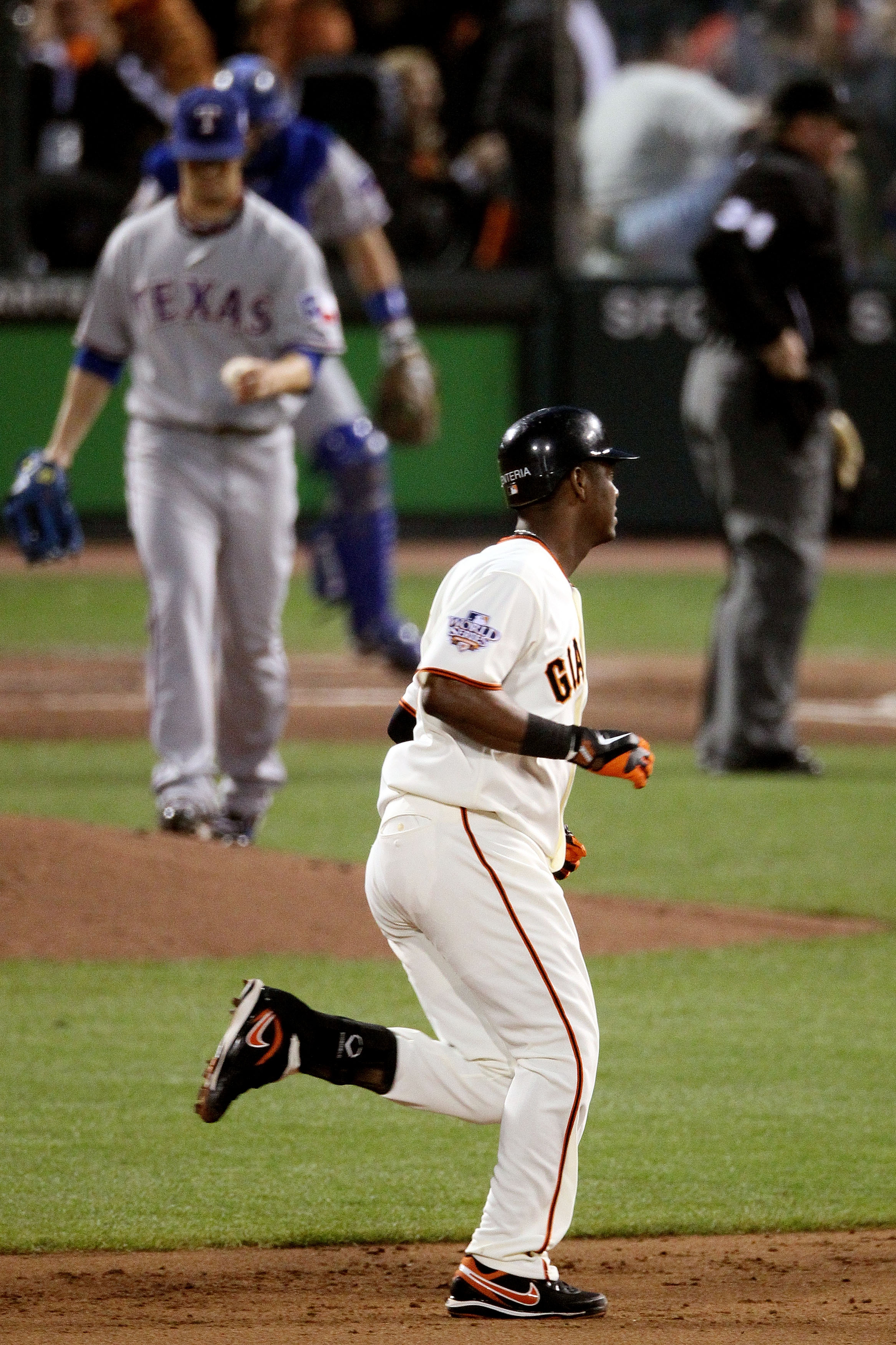 SAN FRANCISCO - OCTOBER 28:  Edgar Renteria #16 of the San Francisco Giants rounds the bases after he hits a fifth inning solo home run off of C.J. Wilson #36 of the Texas Rangers in Game Two of the 2010 MLB World Series at AT&T Park on October 28, 2010 i
