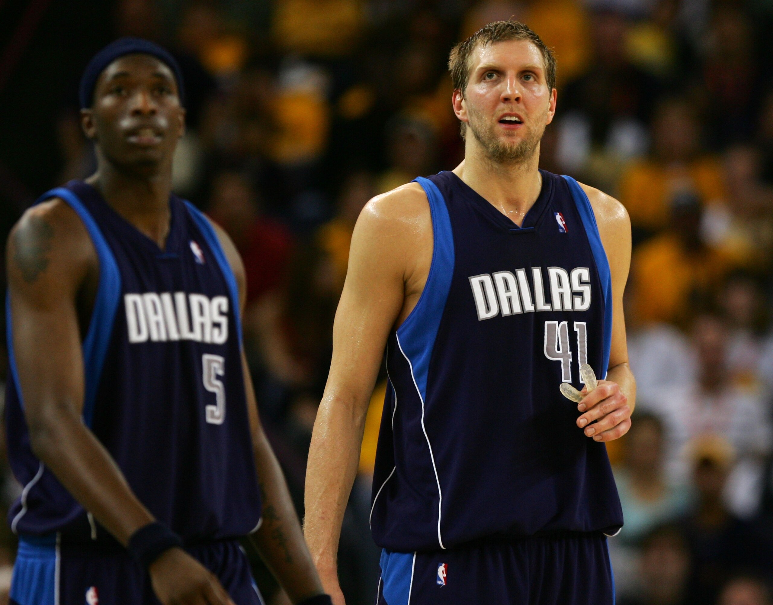 OAKLAND, CA - APRIL 29:  Dirk Nowitzki #41 and Josh Howard #5 of the Dallas Mavericks look on against the Golden State Warriors in Game Four of the Western Conference Quarterfinals during the 2007 NBA Playoffs on April 29, 2007 at Oracle Arena in Oakland,