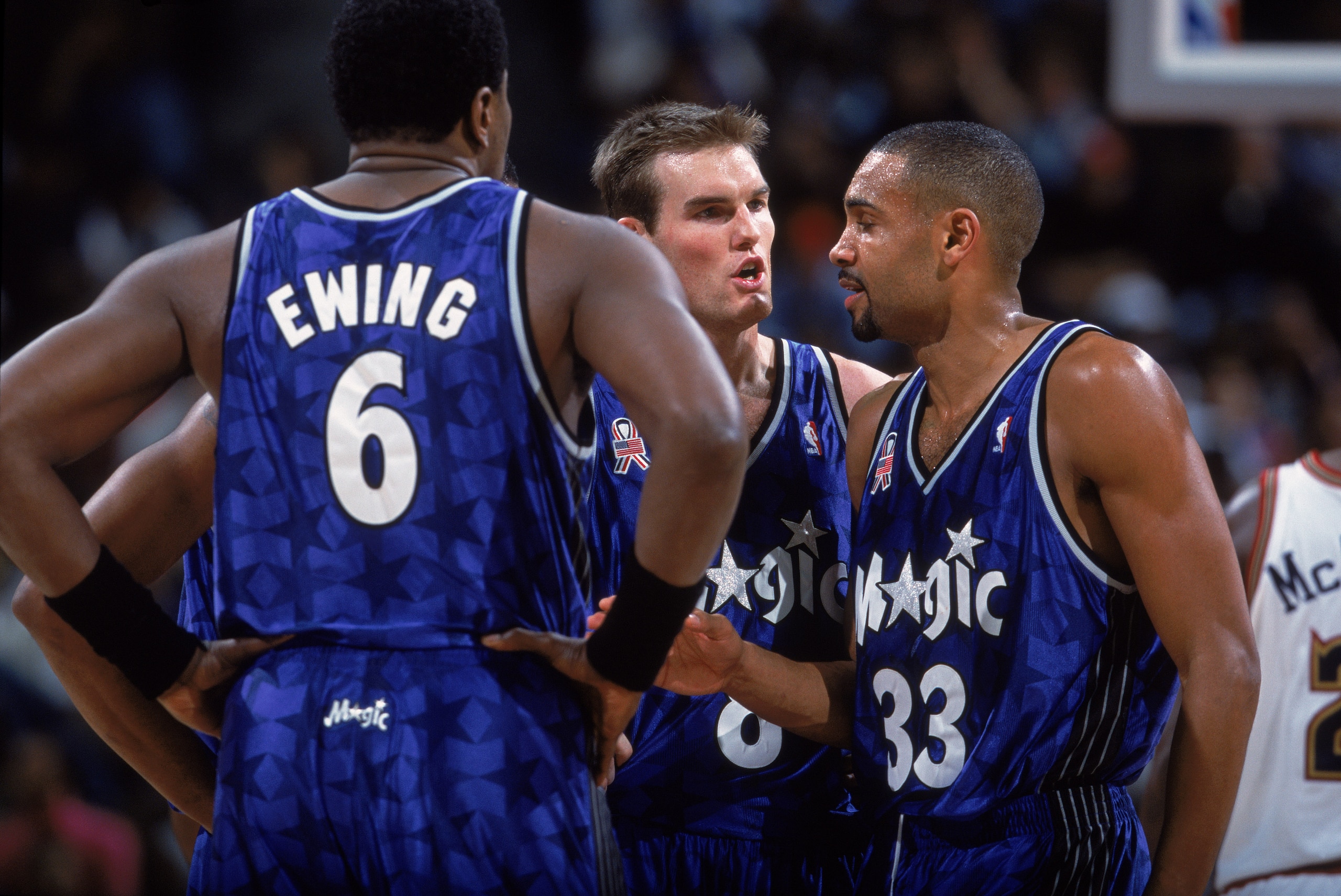 15 Nov 2001:  Pat Garrity #8 of the Orlando Magic talks with teammates Patrick Ewing #6 and Grant Hill #33 during the game against the Denver Nuggets at the Pepsi Center in Denver, Colorado.  The Magic defeated the Nuggets 101-82.  NOTE TO USER: User expr