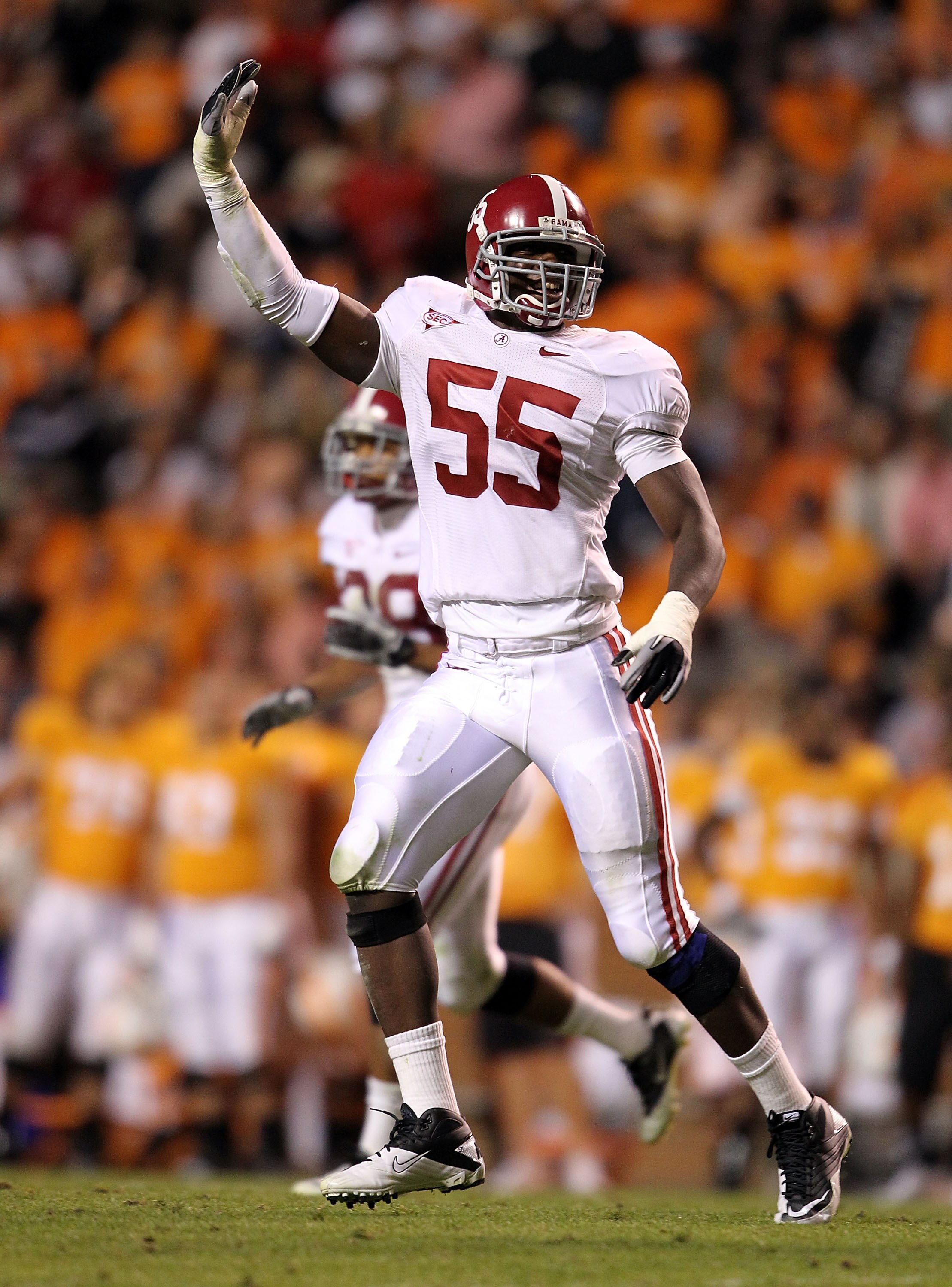 KNOXVILLE, TN - OCTOBER 23:  Chavis Williams #55 of the Alabama Crimson Tide celebrates during the SEC game against the Tennessee Volunteers at Neyland Stadium on October 23, 2010 in Knoxville, Tennessee.  (Photo by Andy Lyons/Getty Images)