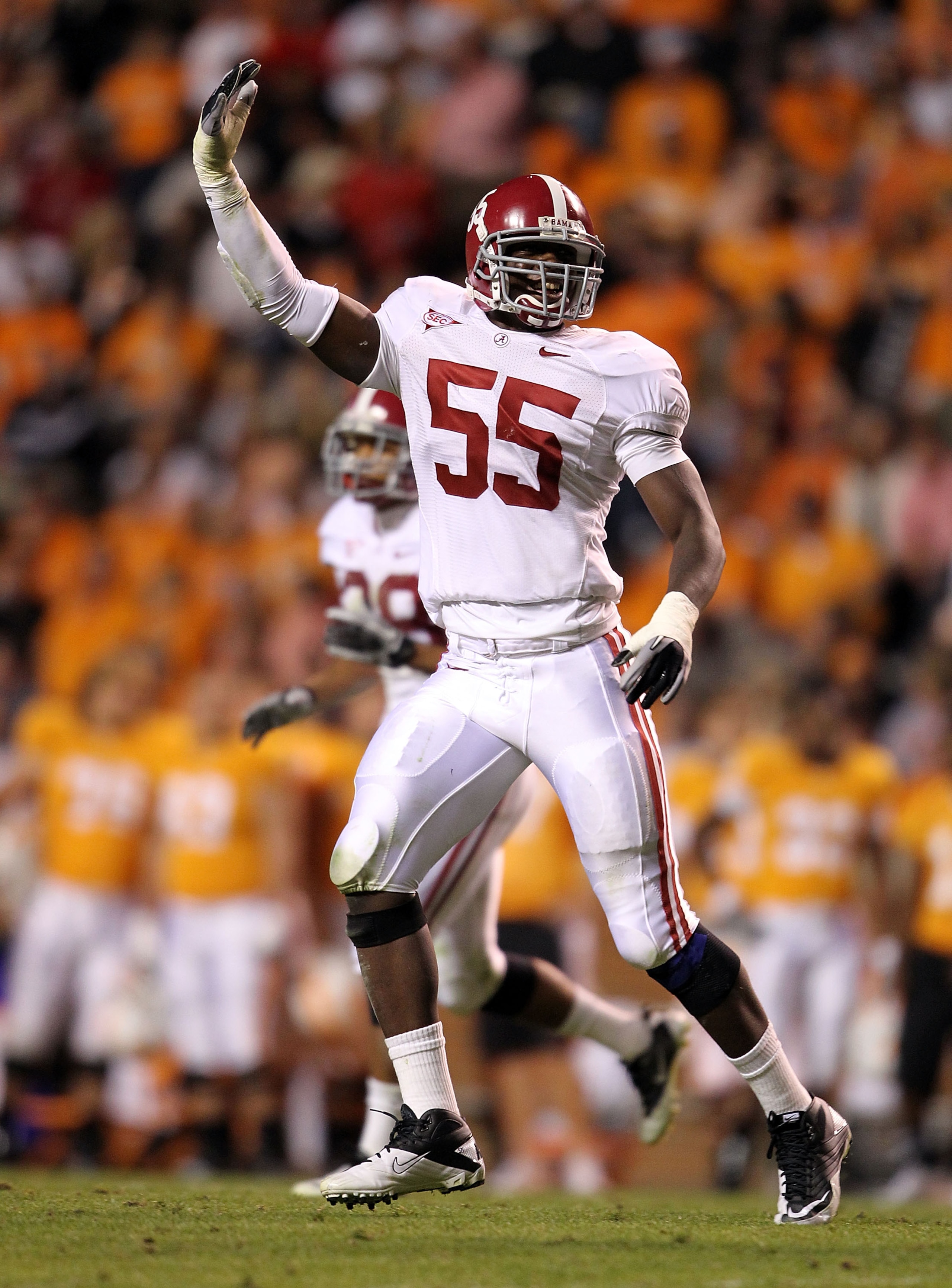 KNOXVILLE, TN - OCTOBER 23:  Chavis Williams #55 of the Alabama Crimson Tide celebrates during the SEC game against the Tennessee Volunteers at Neyland Stadium on October 23, 2010 in Knoxville, Tennessee.  (Photo by Andy Lyons/Getty Images)