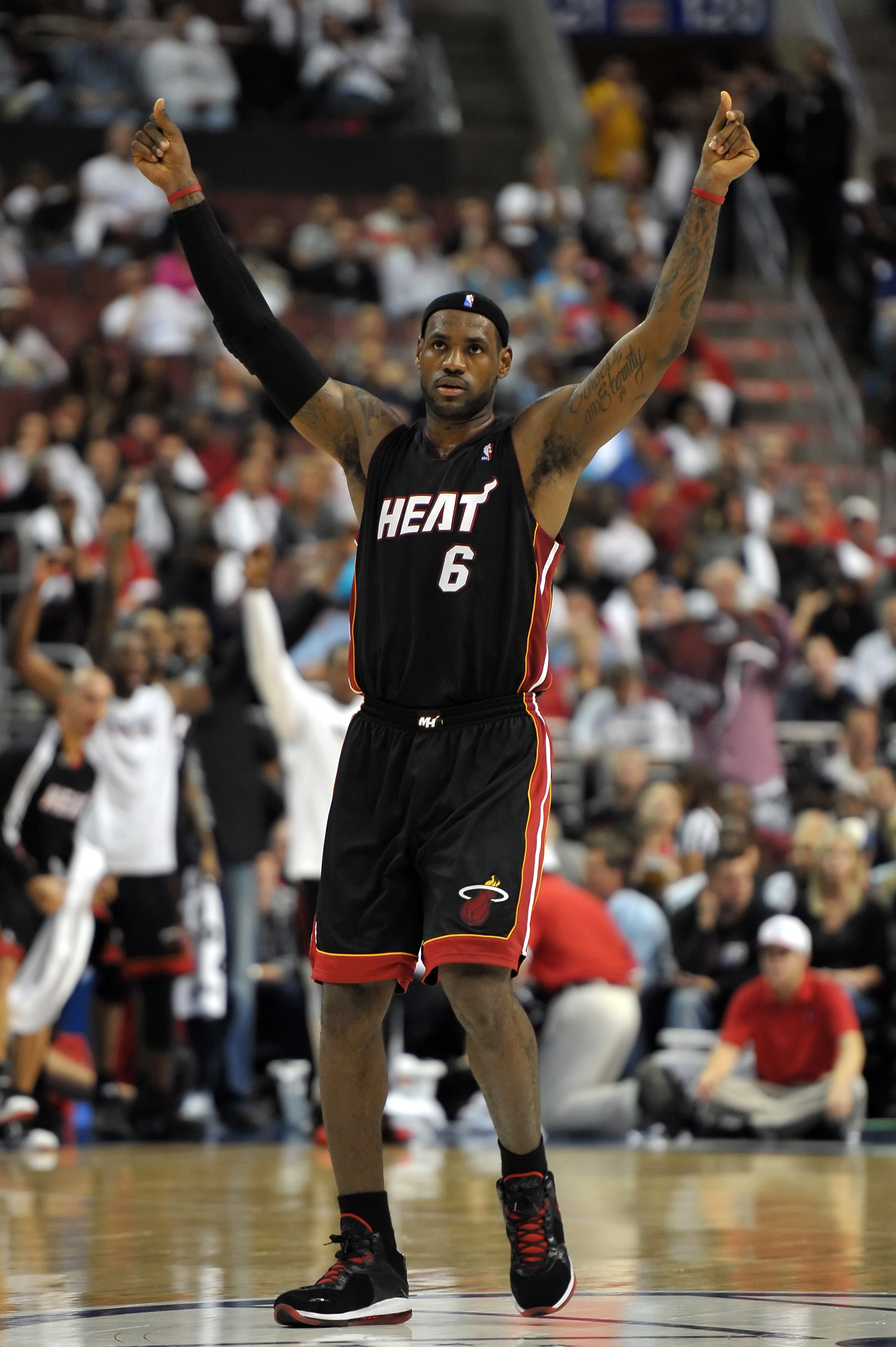 PHILADELPHIA - OCTOBER 27:  LeBron James #6 of the Miami Heat raises his arms after scoring during the game against the Philadelphia 76ers at the Wells Fargo Center on October 27, 2010 in Philadelphia, Pennsylvania. NOTE TO USER: User expressly acknowledg