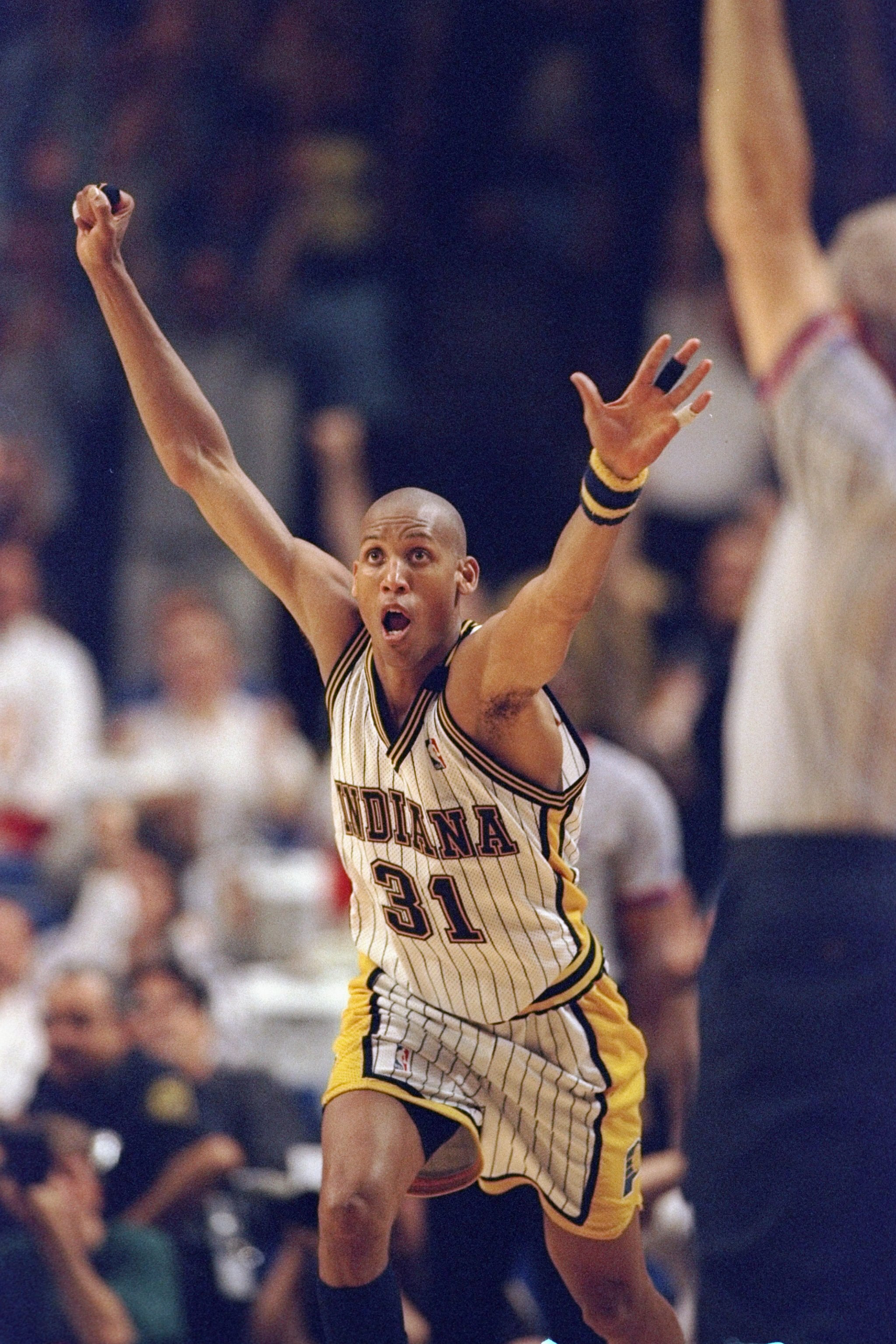 25 May 1998: Reggie Miller #31 of the Indiana Pacers celebrates during an Eastern Conference Final game against the Chicago Bulls at the Market Square Arena in Indianapolis, Indiana. The Pacers defeated the Bulls 96-94.
