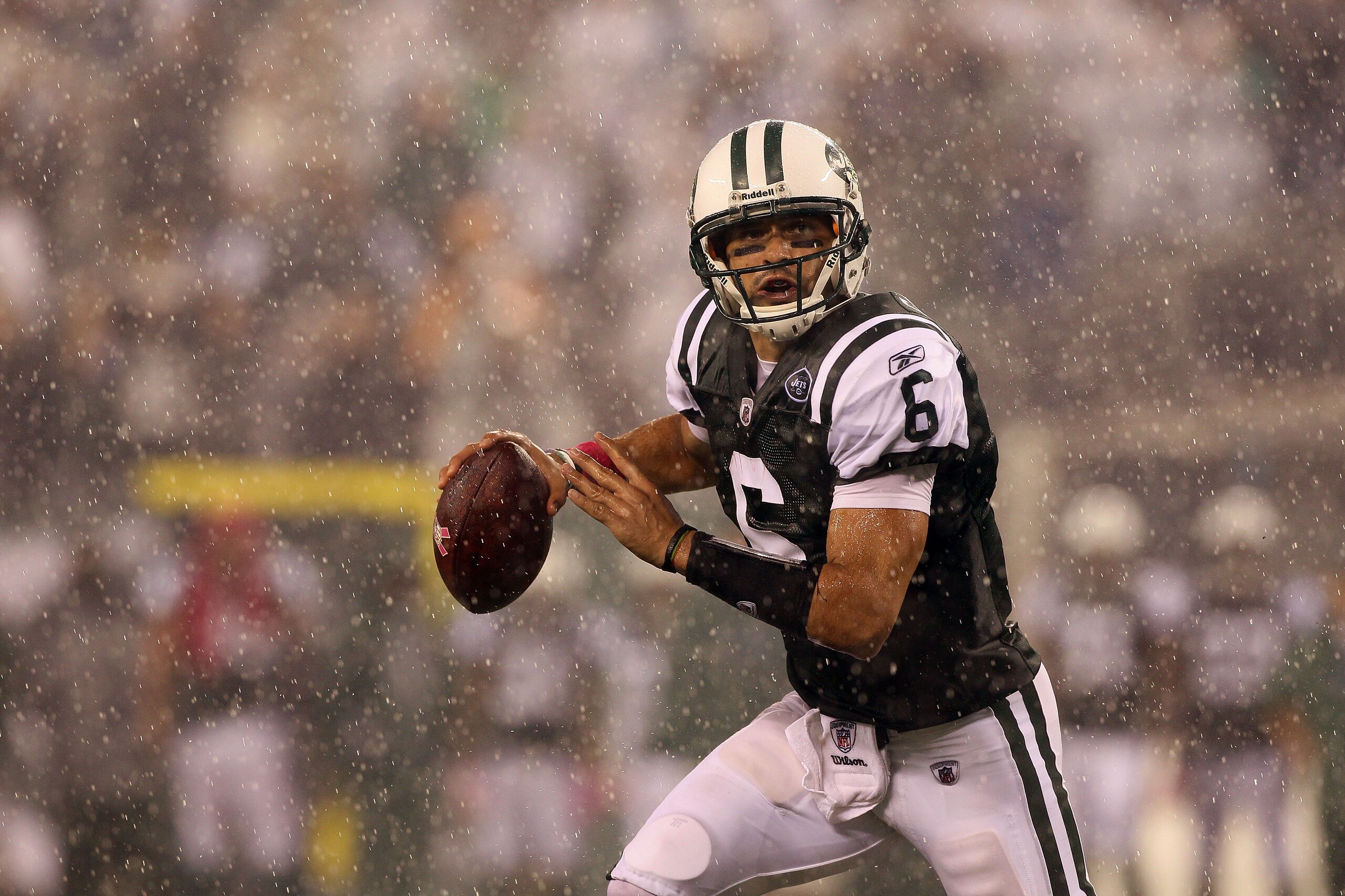 EAST RUTHERFORD, NJ - OCTOBER 11:  Quarterback Mark Sanchez #6 of the New York Jets looks to throw a pass in the second quarter against the Minnesota Vikings at New Meadowlands Stadium on October 11, 2010 in East Rutherford, New Jersey. The Jets won 29-20