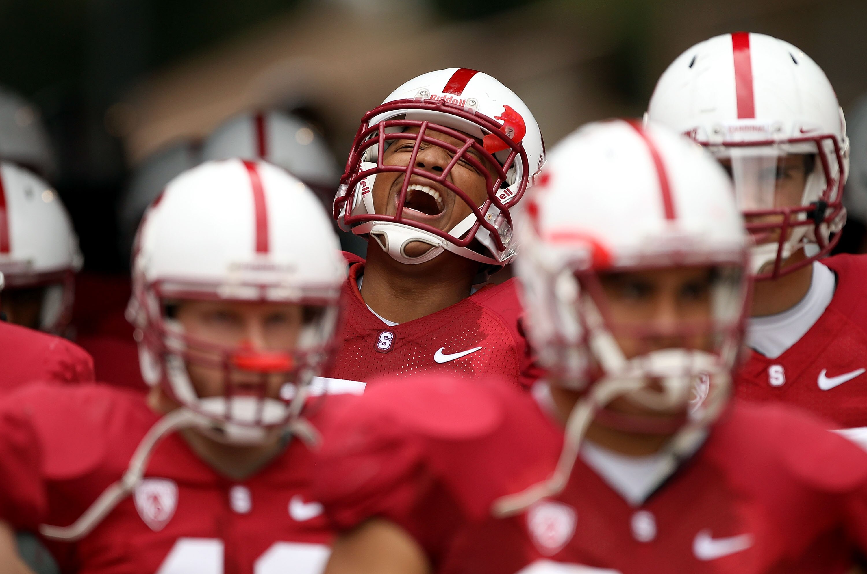 PALO ALTO, CA - OCTOBER 23:  Derek Hall #53 of the Stanford Cardinal gets fired up as he walks out of the tunnel for their game against the Washington State Cougars at Stanford Stadium on October 23, 2010 in Palo Alto, California.  (Photo by Ezra Shaw/Get