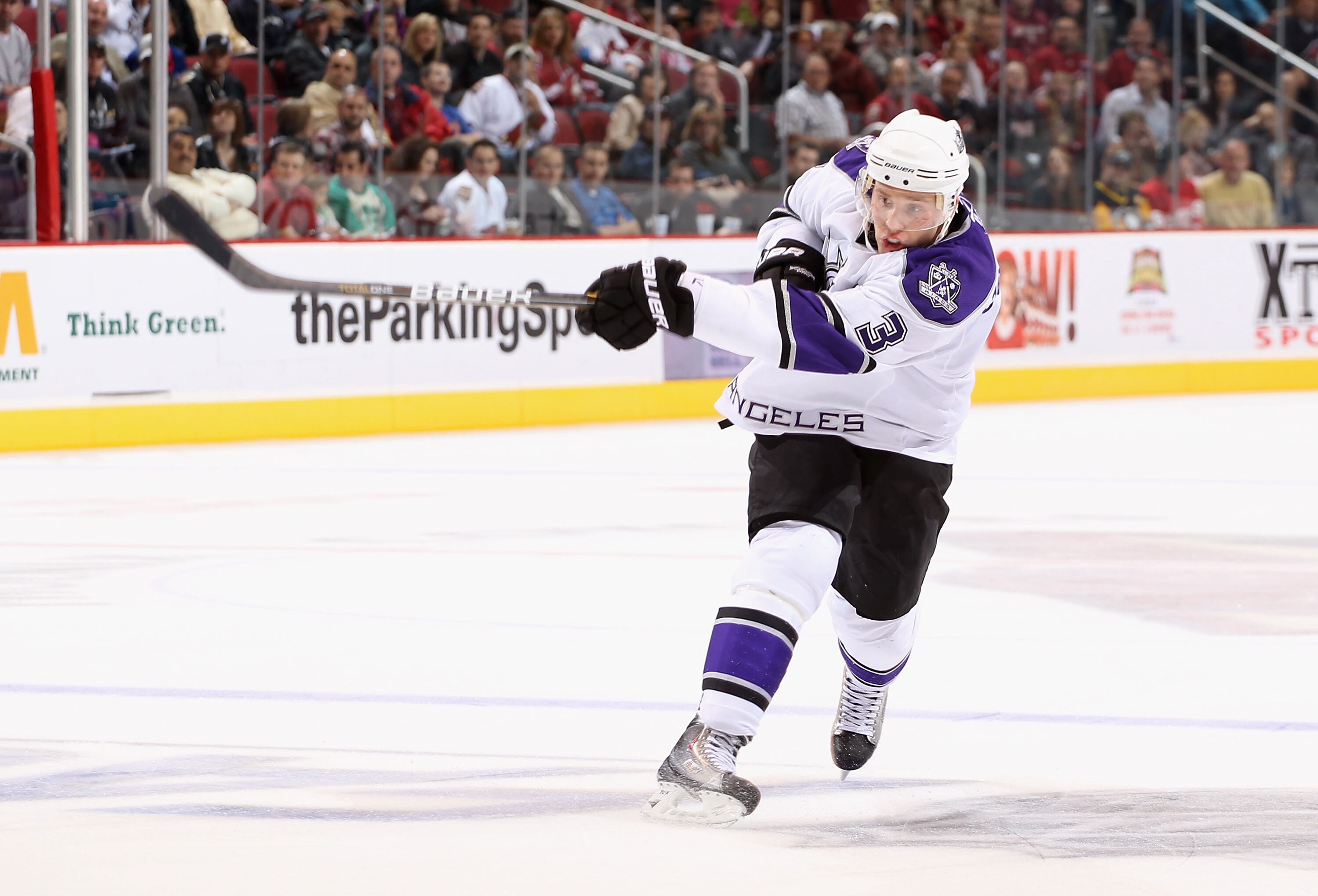GLENDALE, AZ - OCTOBER 21:  Jack Johnson #3 of the Los Angeles Kings shoots the puck during the NHL game against the Phoenix Coyotes at Jobing.com Arena on October 21, 2010 in Glendale, Arizona. The Coyotes defeated the Kings 4-2.  (Photo by Christian Pet