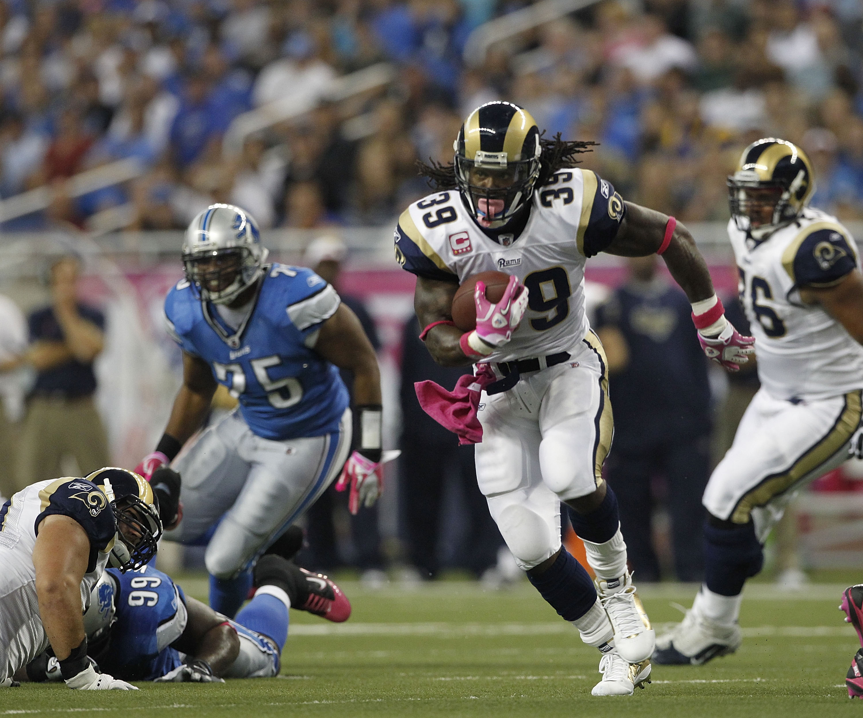 DETROIT - OCTOBER 10: Steven Jackson #39 of the St. Louis Rams runs for a first down during the game against the Detroit Lions at Ford Field on October 10, 2010 in Detroit, Michigan.  (Photo by Leon Halip/Getty Images)