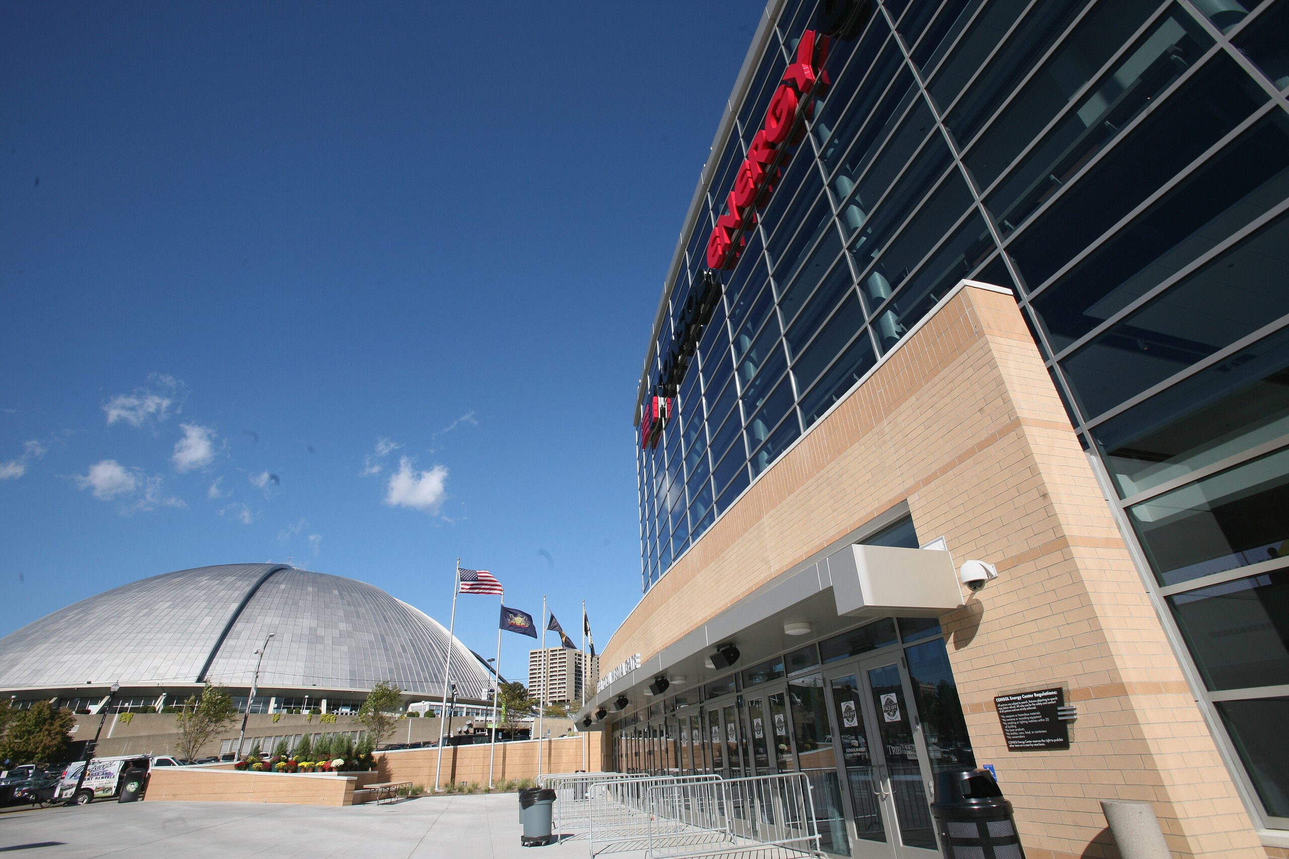 PITTSBURGH - OCTOBER 07:  The Pittsburgh Penguins old facility, the Mellon Arena (alos known as The Igloo) is dwarfed by their new arena, the Consol Energy Center as photographed prior to the opening game against the Philadelphia Flyers on October 7, 2010