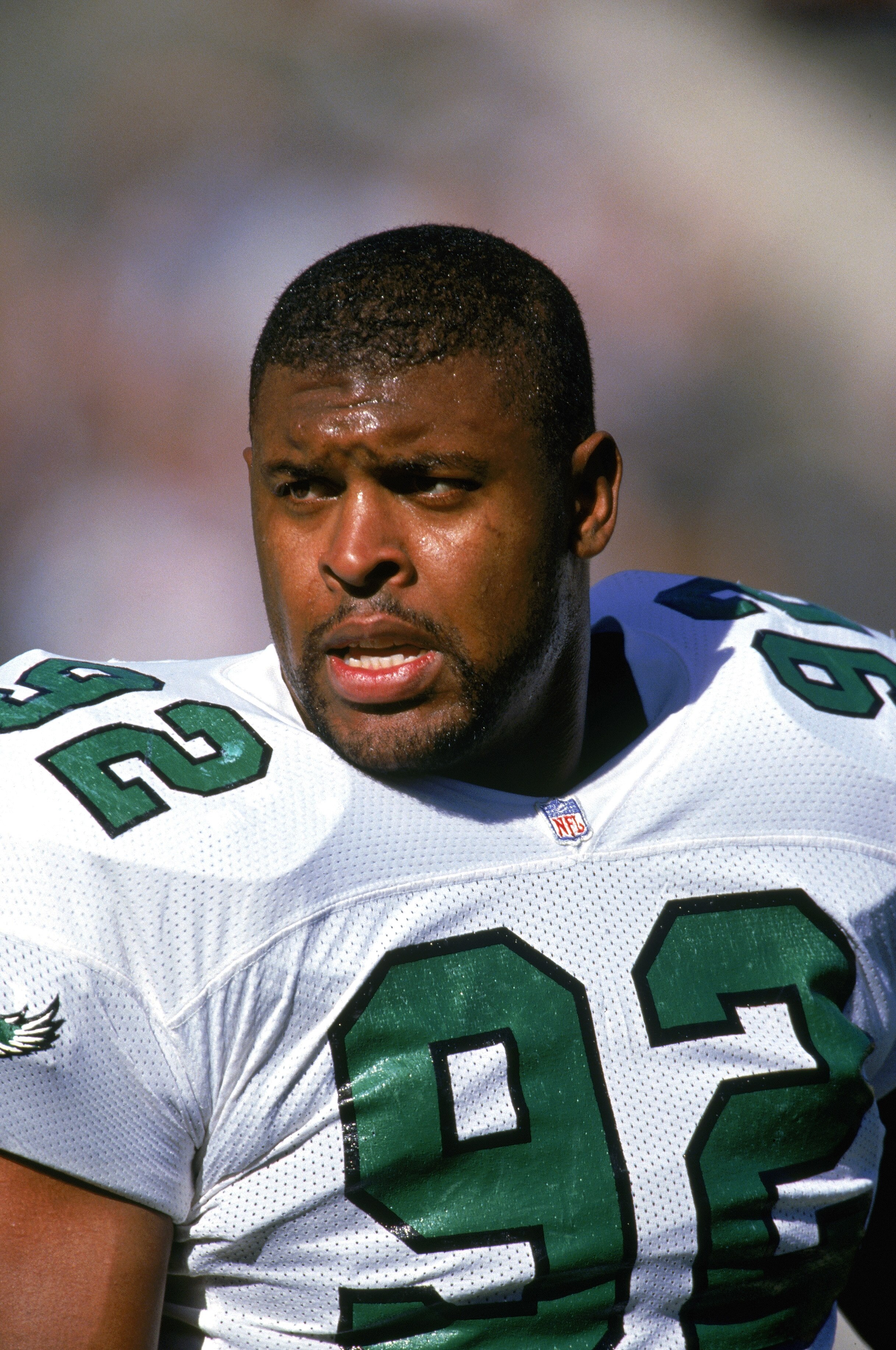 PHOENIX - NOVEMBER 24:  Defensive end Reggie White #92 of the Philadelphia Eagles stands on the sideline during a game against the Phoenix Cardinals on November 24, 1991at Sun Devil Stadium in Phoenix, Arizona. (Photo by Mike Powell/Getty Images)
