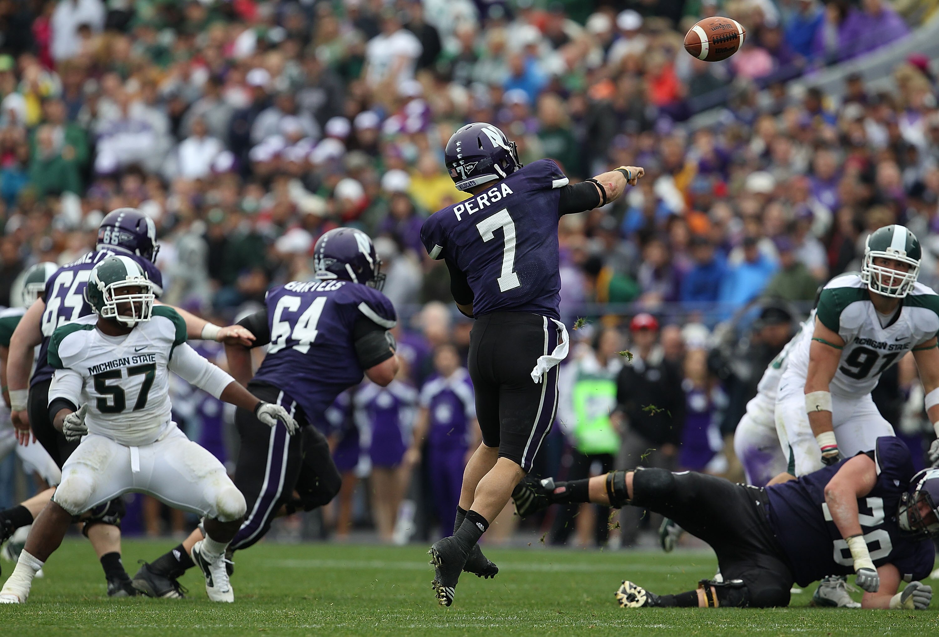 EVANSTON, IL - OCTOBER 23: Dan Persa #7 of the Northwestern Wildcats throws a pass against the Michigan State Spartans at Ryan Field on October 23, 2010 in Evanston, Illinois. Michigan State defeated Northwestern 35-27. (Photo by Jonathan Daniel/Getty Ima