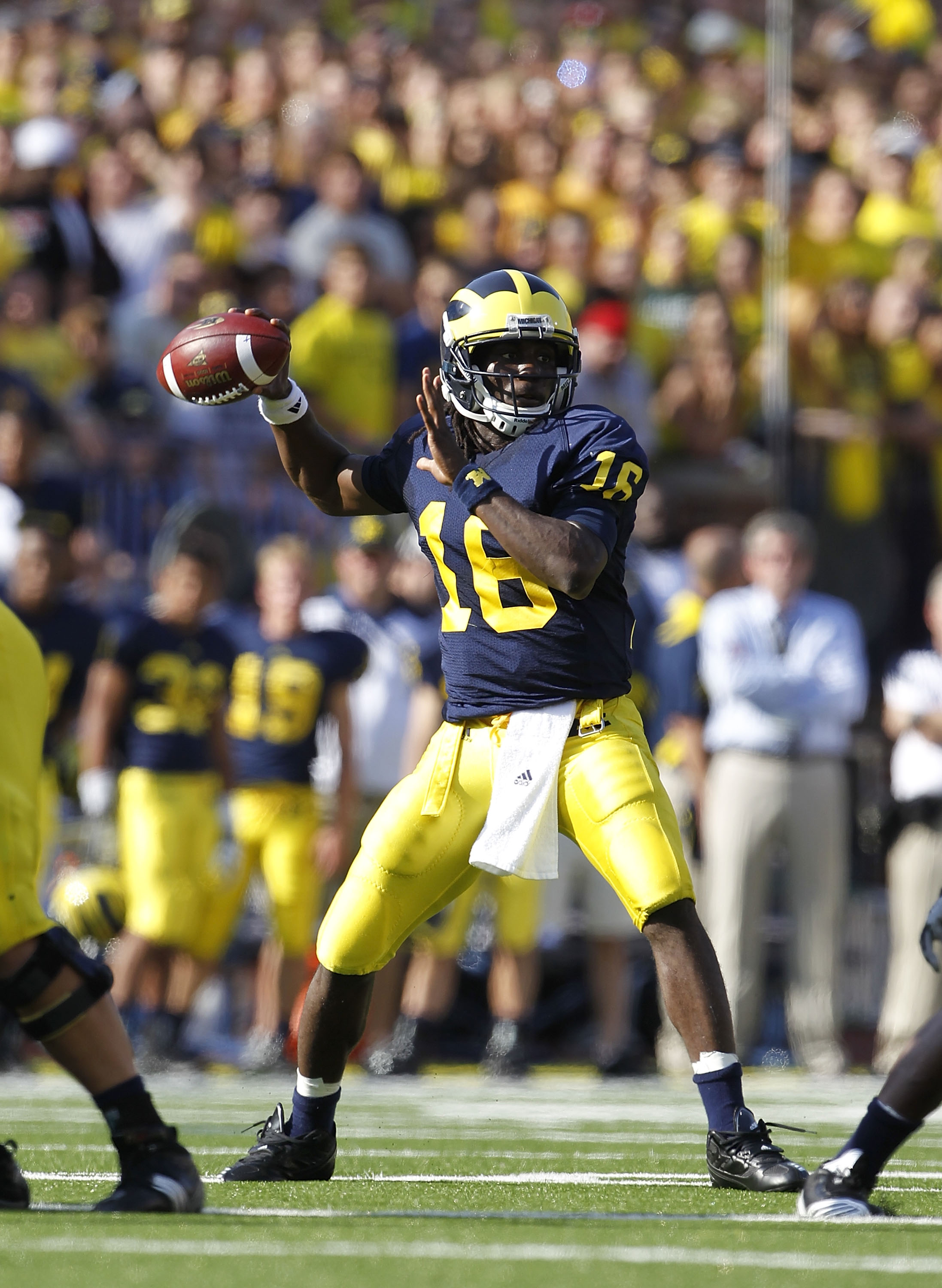 ANN ARBOR, MI - OCTOBER 09: Denard Robinson #16 of the Michigan Wolverines drops back to pass in the second quarter during the game against the Michigan State Spartans on October 9, 2010 at Michigan Stadium in Ann Arbor, Michigan. (Photo by Leon Halip/Get