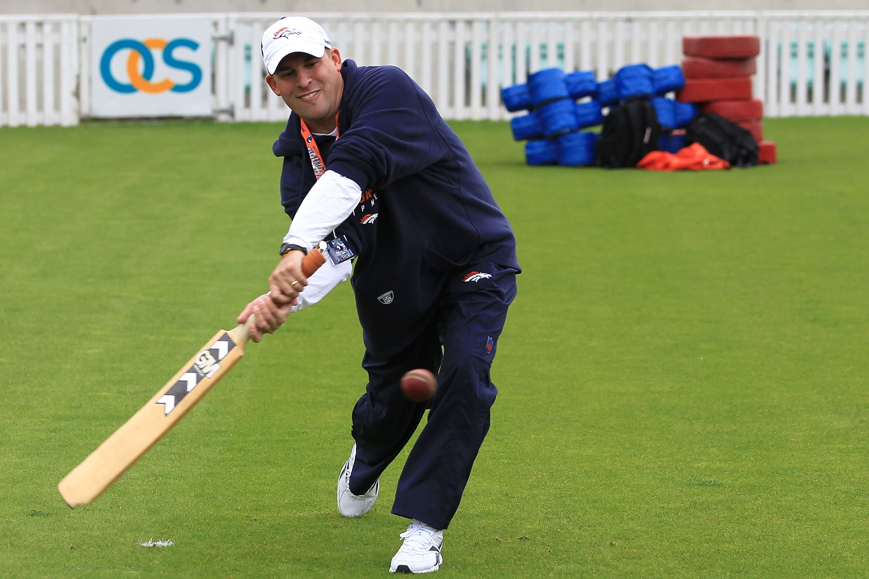 LONDON, ENGLAND - OCTOBER 29:  Head coach of the Denver Broncos Josh McDaniels plays cricket prior to the start of a team training session at The Brit Oval on October 29, 2010 in London, England. The Denver Broncos will play the San Francisco 49ers at Wem