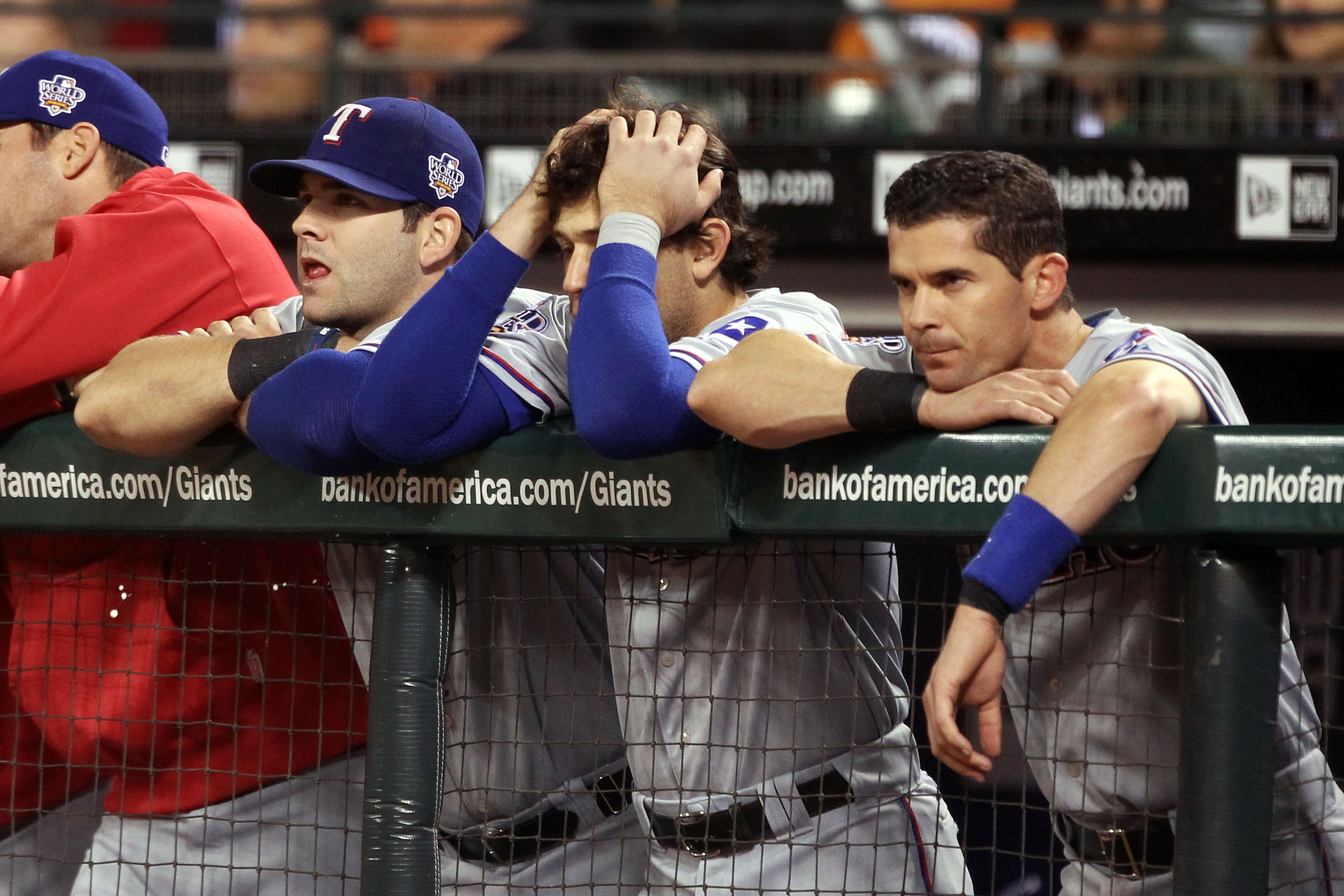 SAN FRANCISCO - OCTOBER 27:  Michael Young #10 and Ian Kinsler #5 of the Texas Rangers look on from the dugout against the San Francisco Giants in Game One of the 2010 MLB World Series at AT&T Park on October 27, 2010 in San Francisco, California.  (Photo