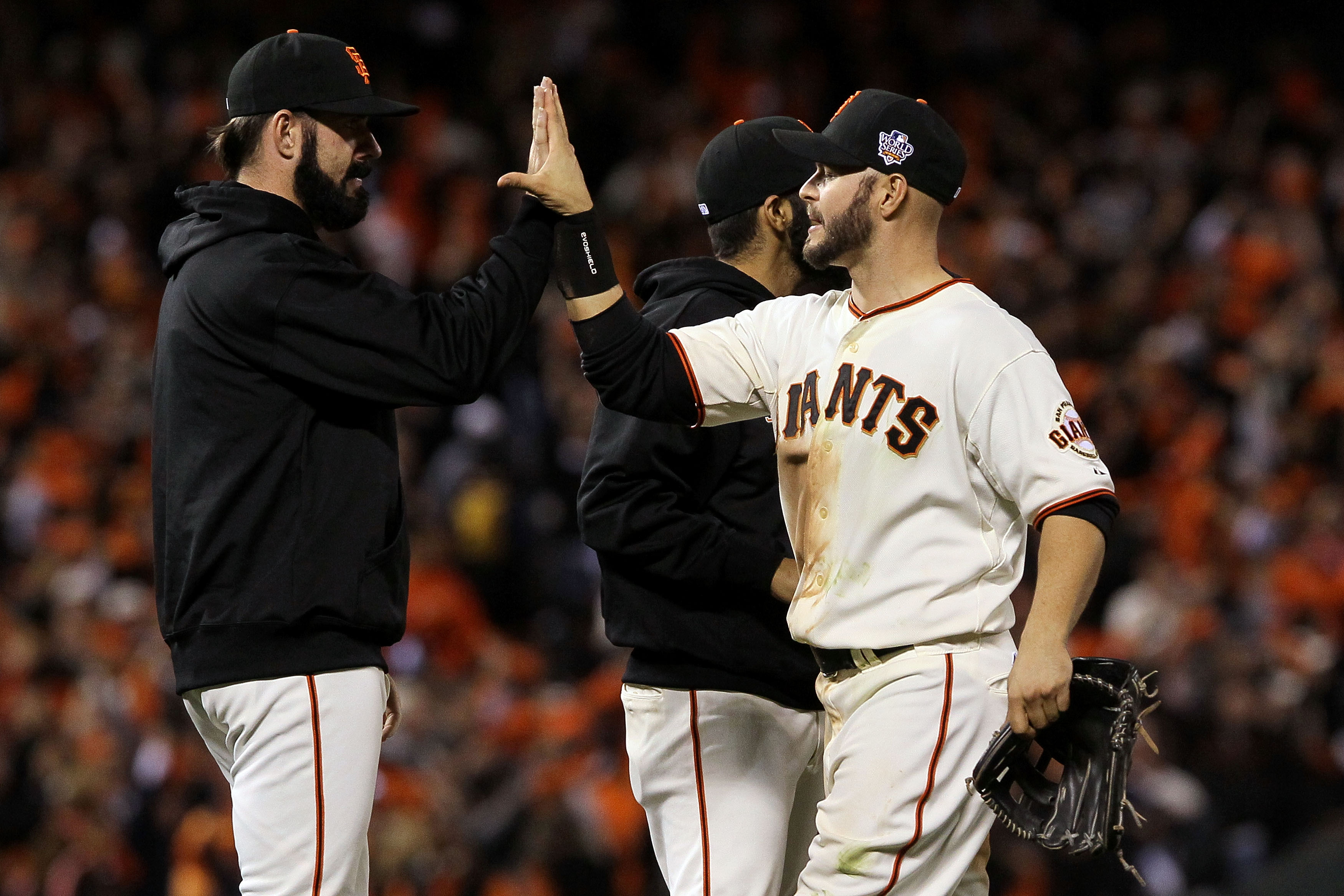 SAN FRANCISCO - OCTOBER 28:  Brian Wilson #38 and Cody Ross #13 of the San Francisco Giants celebrate after the Giants defeated the Texas Rangers 9-0 in Game Two of the 2010 MLB World Series at AT&T Park on October 28, 2010 in San Francisco, California.
