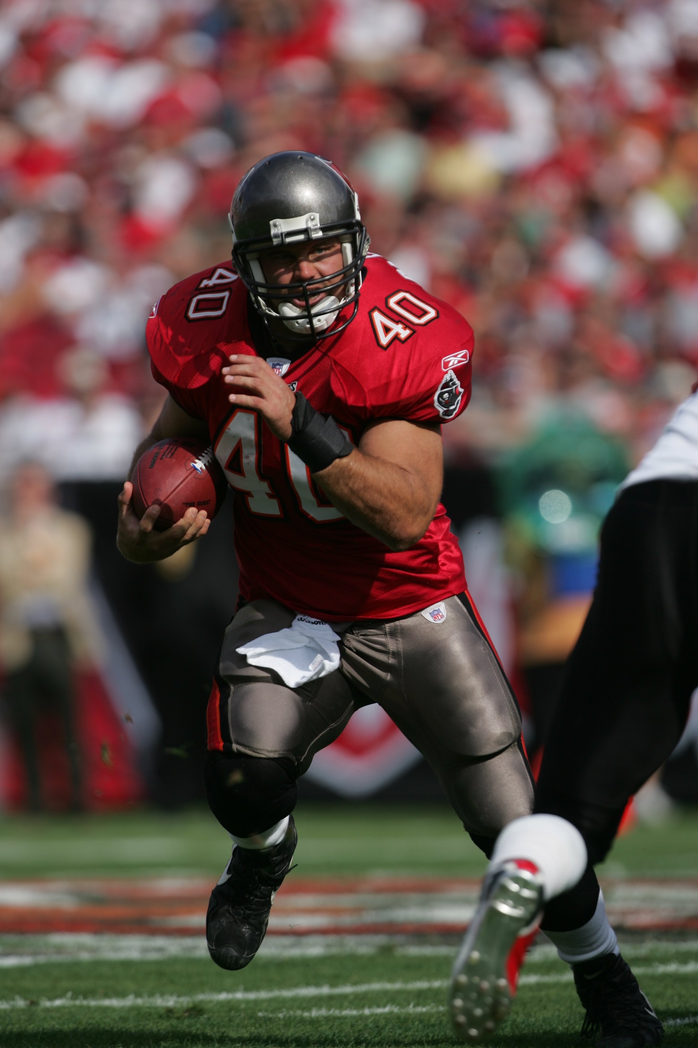 TAMPA, FL - DECEMBER 10:  Fullback Mike Alstott #40 of the Tampa Bay Buccaneers carries the ball against the Atlanta Falcons on December 10, 2006 at Raymond James Stadium in Tampa, Florida. The Falcons defeated the Bucs 17-6. (Photo by Doug Pensinger/Gett