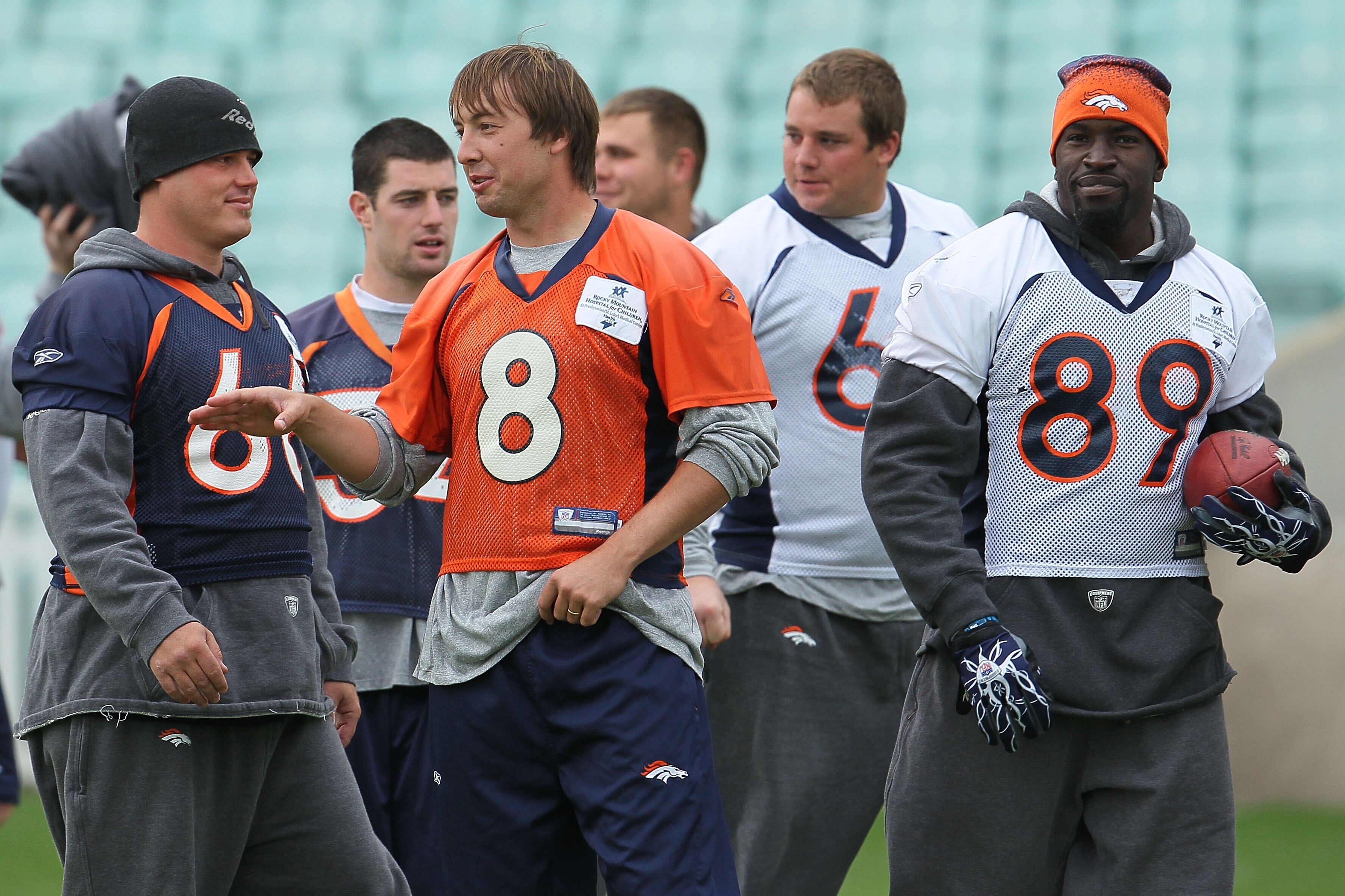 LONDON, ENGLAND - OCTOBER 29:  Quarterback Kyle Orton #8 of the Denver Broncos talks with team mates during a team training session at The Brit Oval on October 29, 2010 in London, England. The Denver Broncos will play the San Francisco 49ers at Wembley St