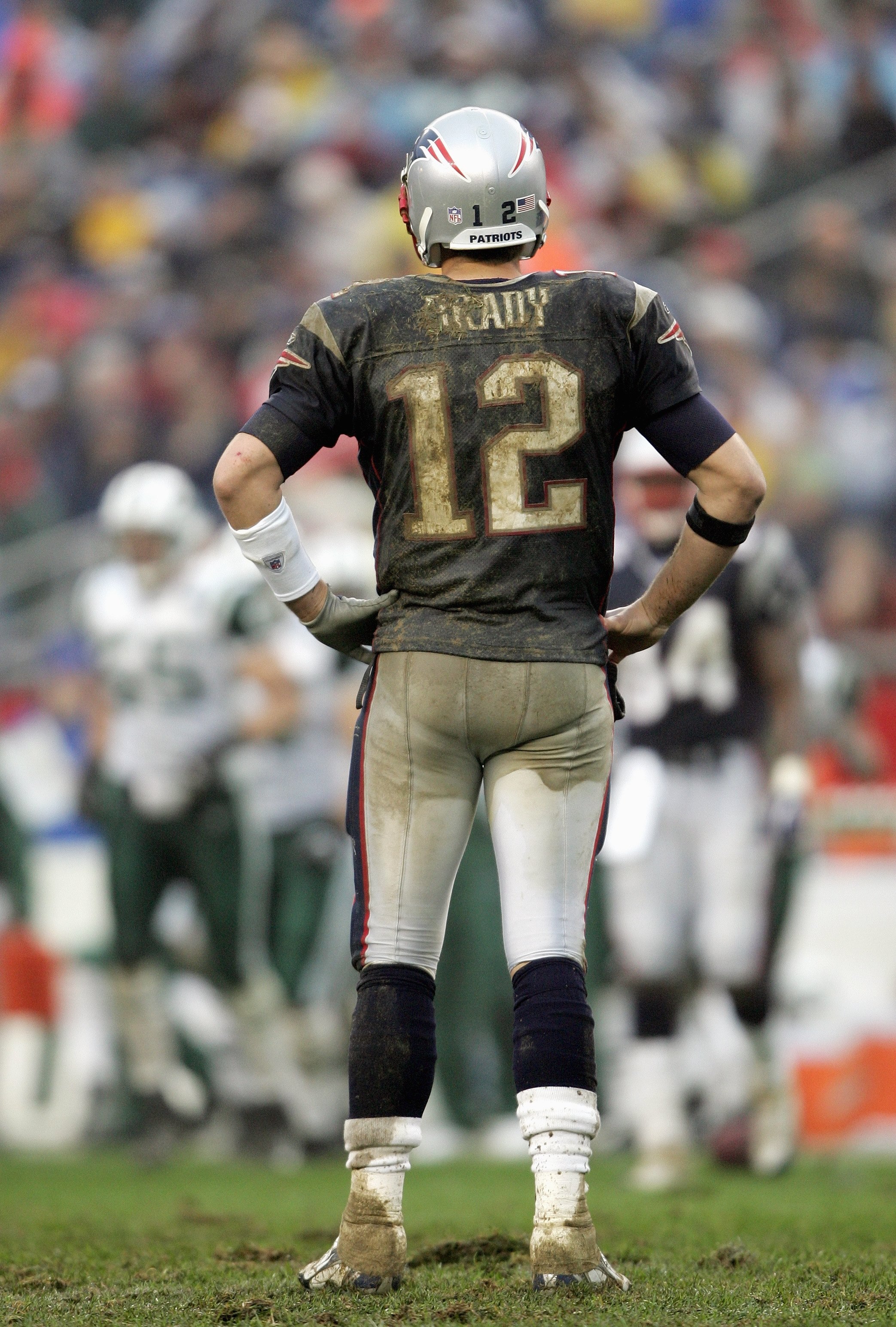 FOXBORO, MA - NOVEMBER 12: Quarterback Tom Brady #12 of the New England Patriots stands on the field during against the New York Jets on November 12, 2006 at Gillette Stadium in Foxboro, Massachusetts. The Jets defeated the Patriots 17-14. (Photo by Elsa FOXBORO, MA - NOVEMBER 12: Quarterback Tom Brady #12 of the New England Patriots stands on the field during against the New York Jets on November 12, 2006 at Gillette Stadium in Foxboro, Massachusetts. The Jets defeated the Patriots 17-14. (Photo by Elsa