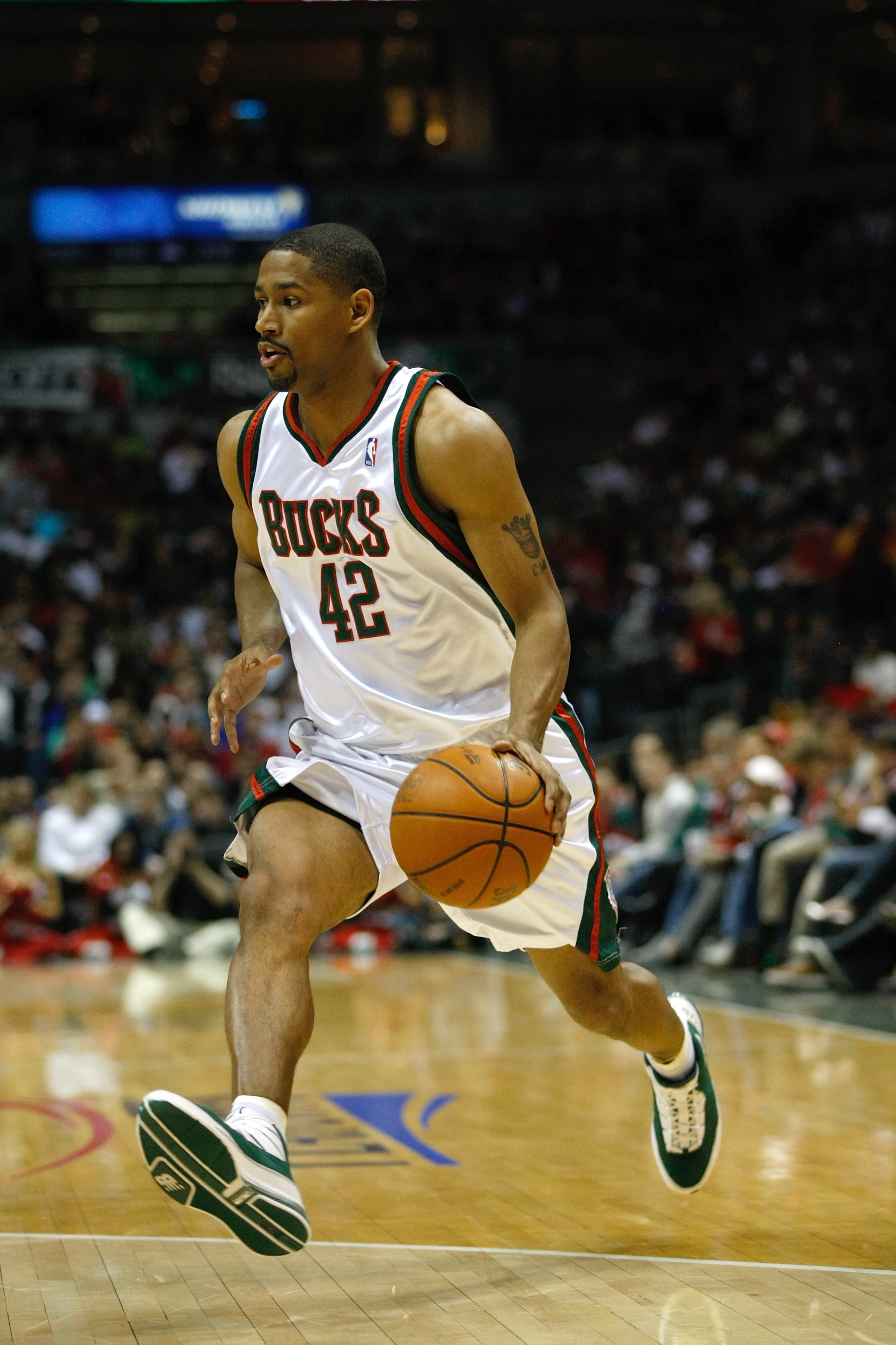 MILWAUKEE, WI - APRIL 24: Charlie Bell #42 of the Milwaukee Bucks dribbles the basketball against the Atlanta Hawks during Game Three of Eastern Conference Quarterfinals of the 2010 NBA Playoffs at the Bradley Center on April 24, 2010 in Milwaukee, Wiscon