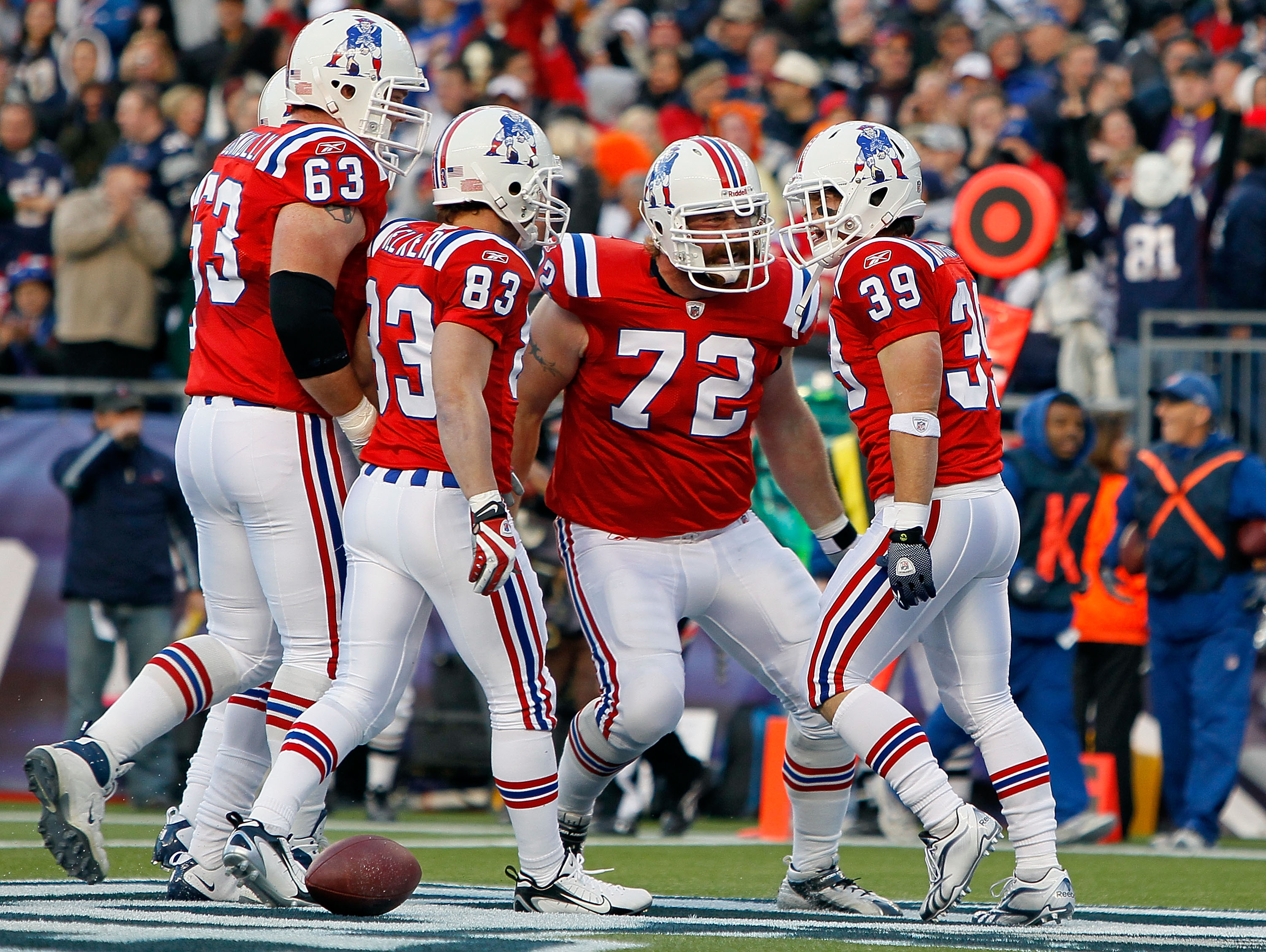 FOXBORO, MA - OCTOBER 31:  Danny Woodhead #39 of the New England Patriots celebrates his touchdown with teammates Dan Connolly #63, Wes Welker #83, and Matt Light #72 against the Minnesota Vikings in the first half at Gillette Stadium on October 31, 2010