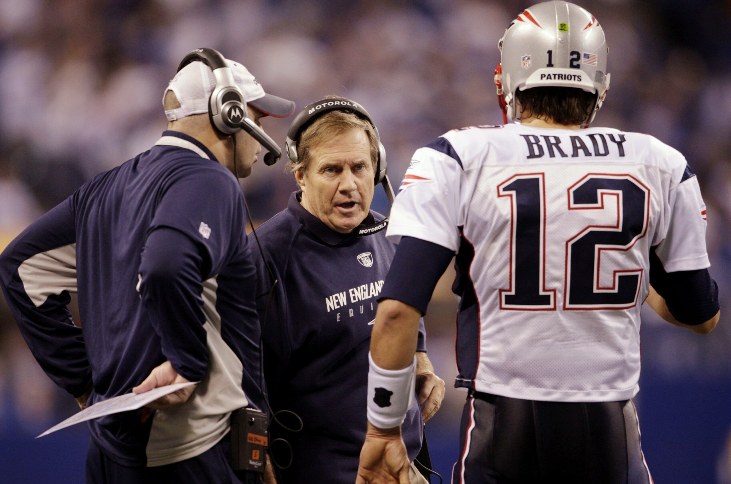 INDIANAPOLIS - NOVEMBER 15: Quarterback Tom Brady #12 of the New England Patriots speaks to head coach Bill Belichick in the fourth quarter of the game against the Indianapolis Colts at Lucas Oil Stadium on November 15, 2009 in Indianapolis, Indiana. The 