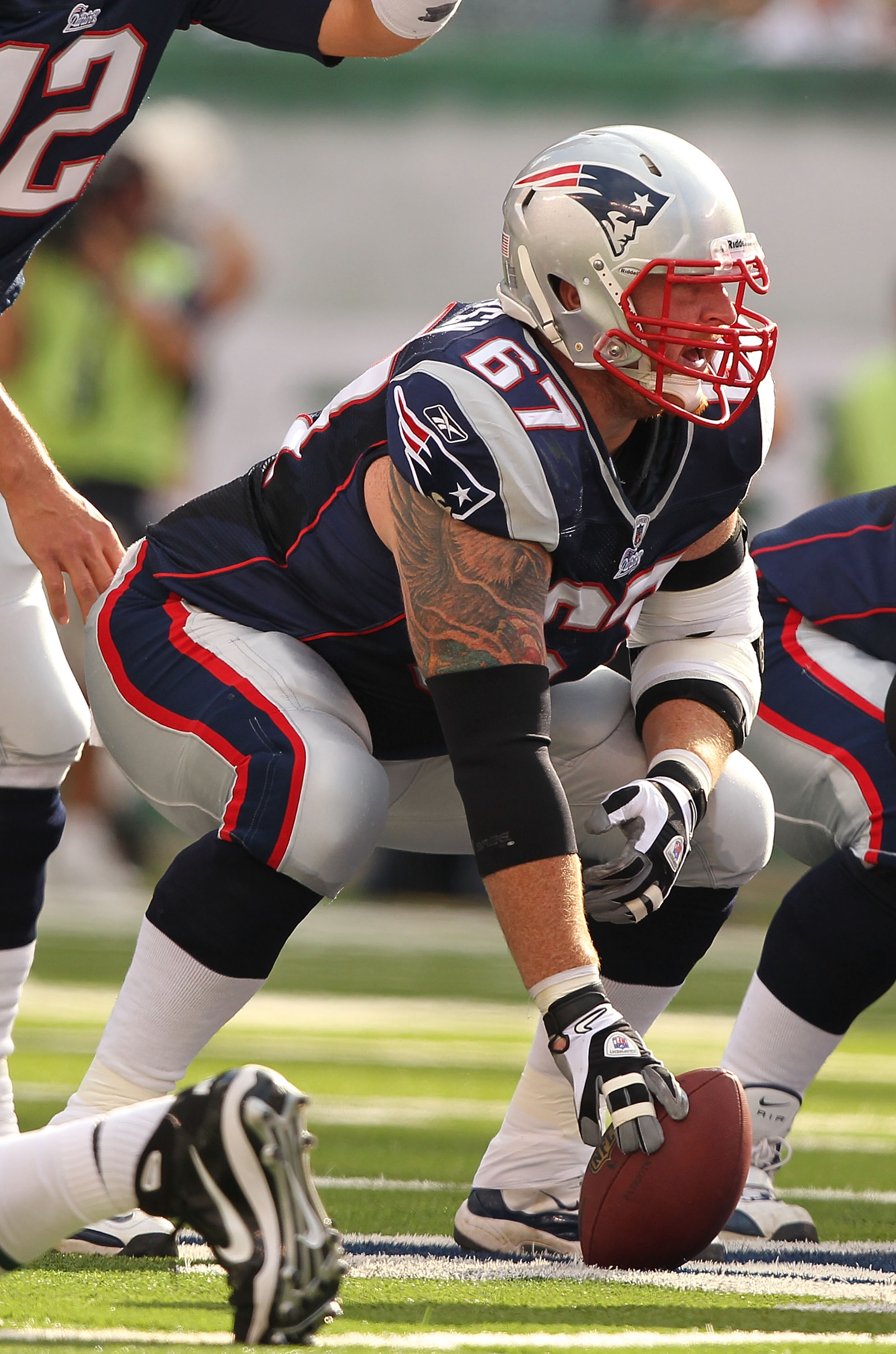 EAST RUTHERFORD, NJ - SEPTEMBER 19:  Dan Koppen #67 of the New England Patriots in action against the New York Jets during their  game on September 19, 2010 at the New Meadowlands Stadium  in East Rutherford, New Jersey.  (Photo by Al Bello/Getty Images)