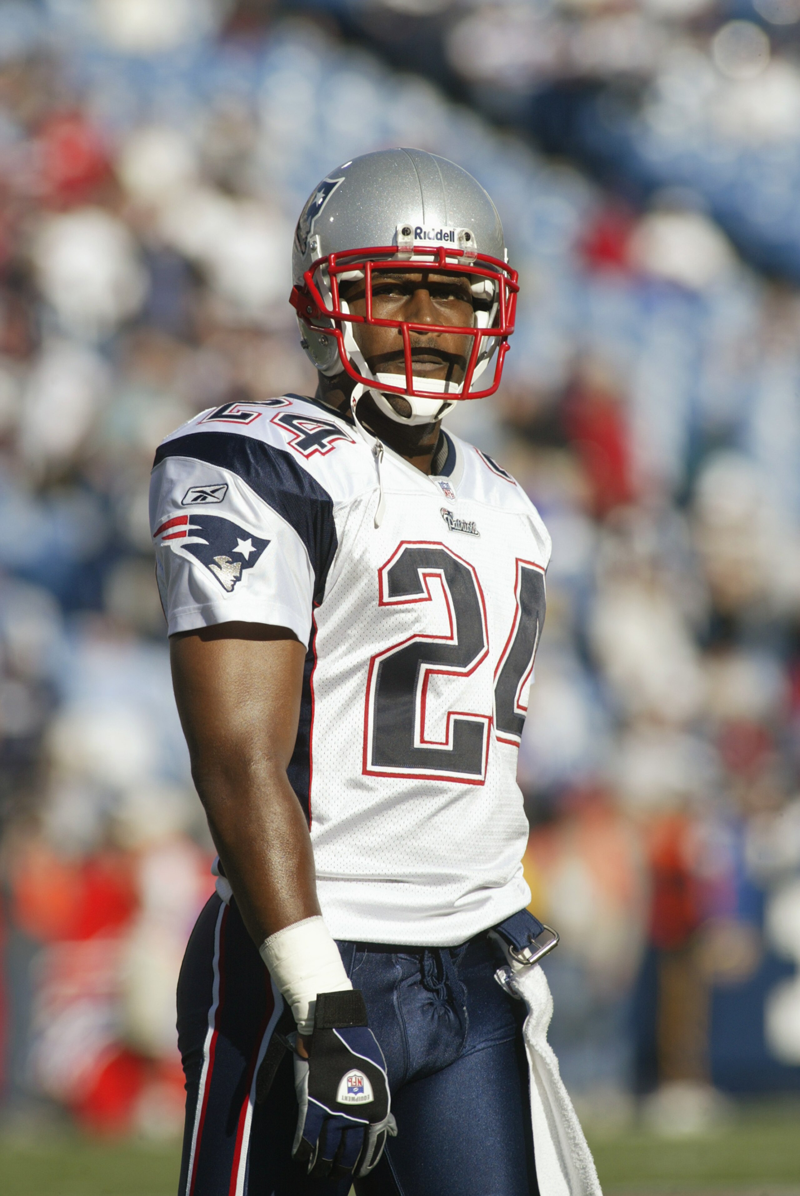 ORCHARD PARK, NY - OCTOBER 3:  Cornerback Ty Law #24 of the New England Patriots watches during the game with the Buffalo Bills on October 3, 2004 at Ralph Wilson Stadium in Orchard Park, New York. The Patriots defeated the Bills 31-17. (Photo by Rick Ste