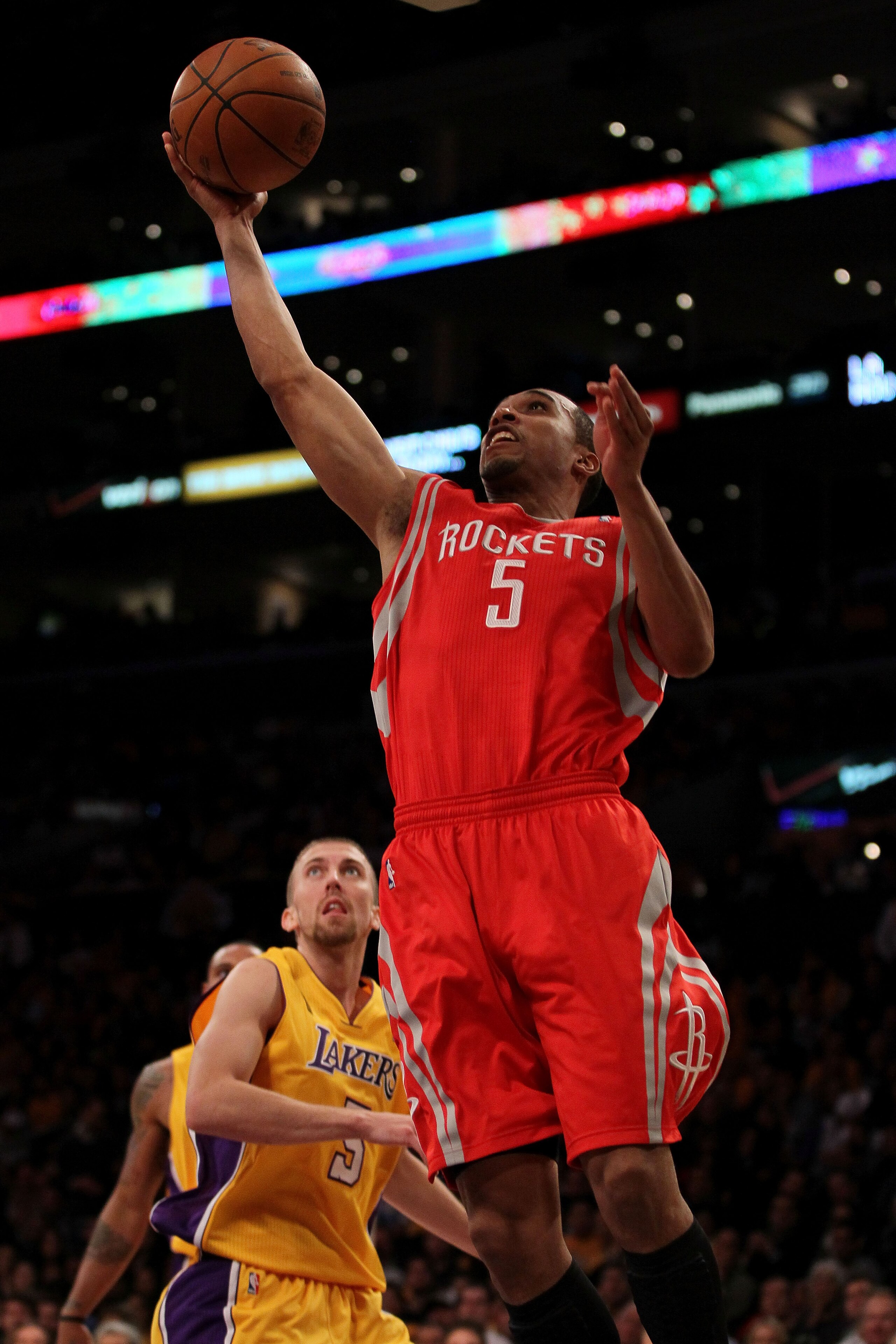LOS ANGELES, CA - OCTOBER 26:  Courtney Lee #5 of the Houston Rockets takes a shot against the Los Angeles Lakers during their opening night game at Staples Center on October 26, 2010 in Los Angeles, California. NOTE TO USER: User expressly acknowledges a