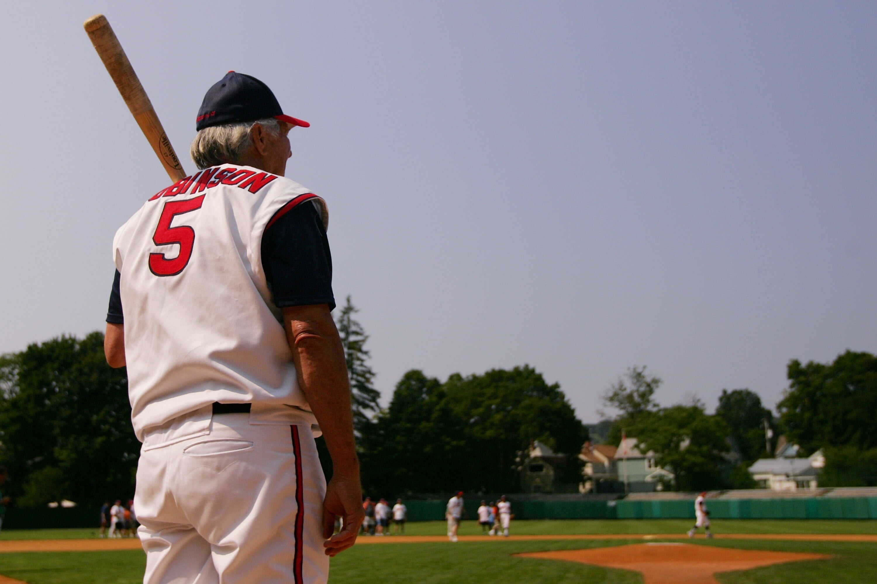 COOPERSTOWN, NY - JULY 27:  Hall of Fame member Brooks Robinson waits to bat during the Play Ball with Ozzie Smith Clinic held at Doubleday Field on July 27, 2007 in Cooperstown, New York.  (Photo by Chris McGrath/Getty Images)