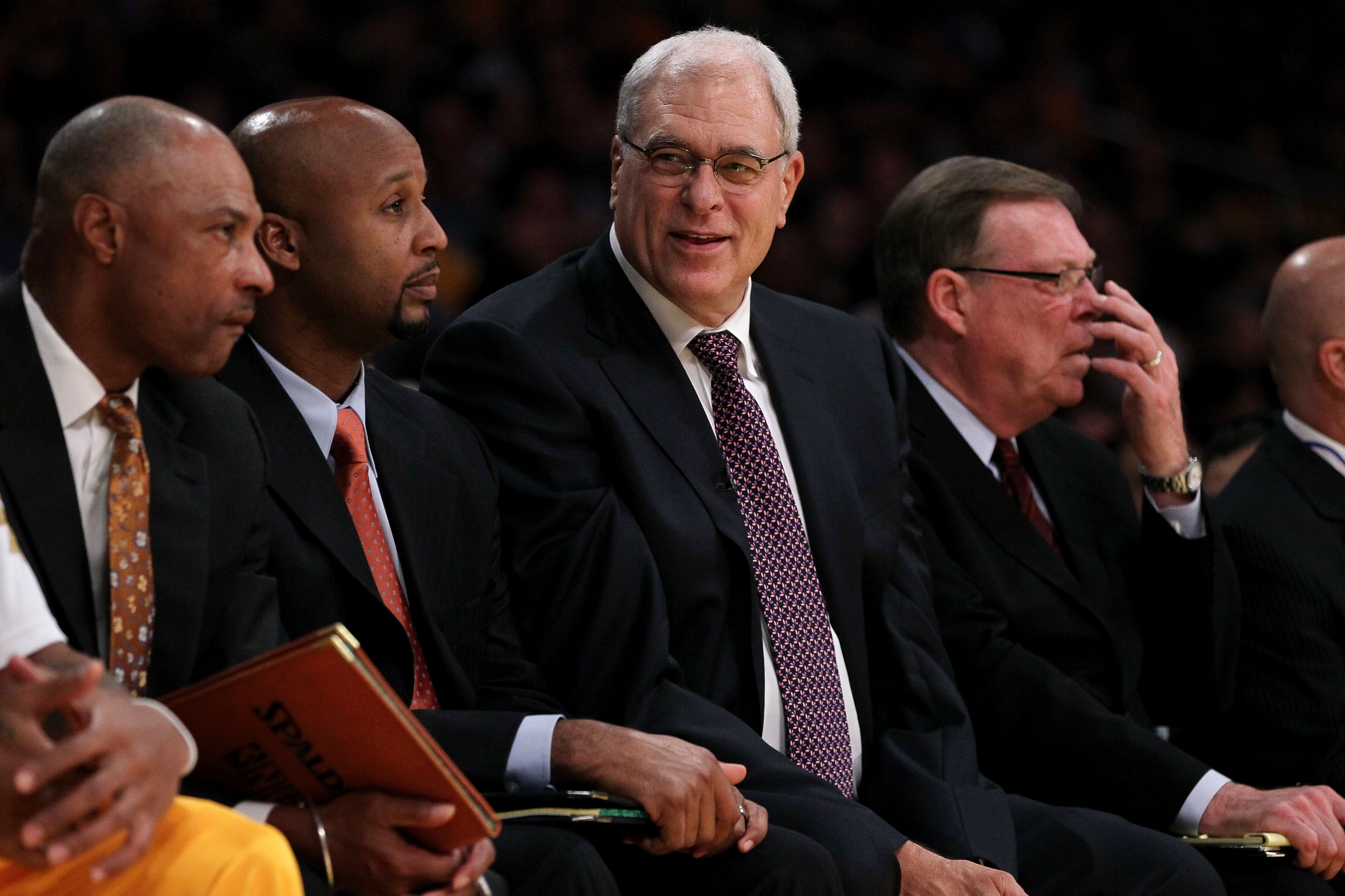 LOS ANGELES, CA - OCTOBER 26:  Head coach Phil Jackson (C) of the Los Angeles Lakers looks on from the bench during the game against the Houston Rockets during opening night at Staples Center on October 26, 2010 in Los Angeles, California. NOTE TO USER: U