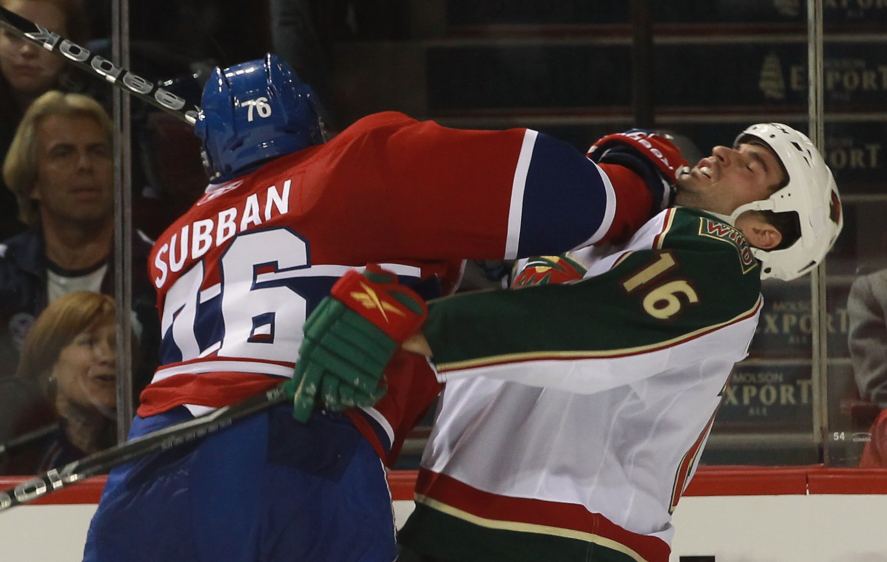 MONTREAL, QC - SEPTEMBER 26: Brad Staubitz #16 of the Minnesota Wild is hit by P.K. Subban #76 of the Montreal Canadiens at the Bell Centre on September 26, 2010 in Montreal, Canada. The Canadiens defetaed the Wild 4-3. (Photo by Bruce Bennett/Getty Image