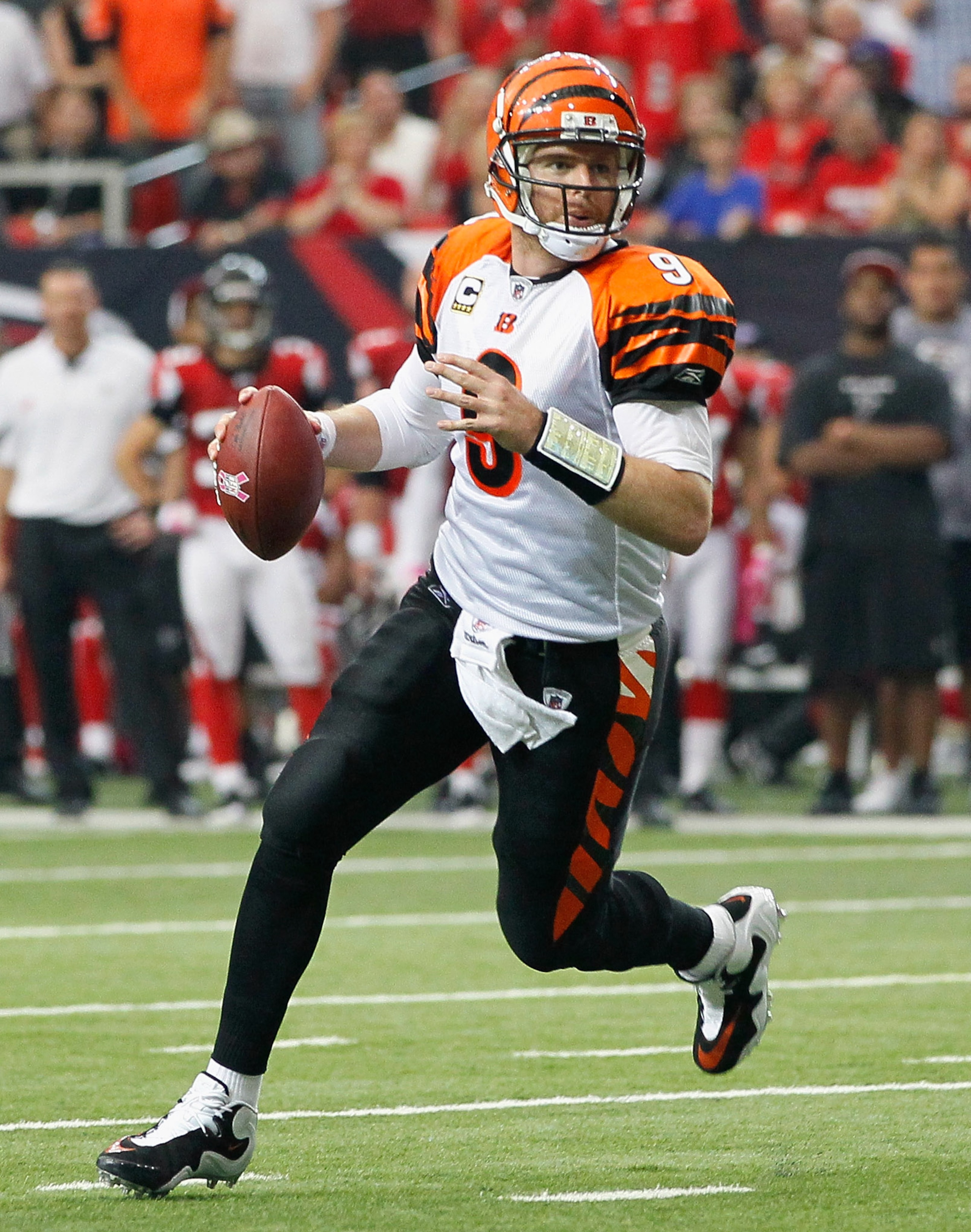 ATLANTA - OCTOBER 24: Quarterback Carson Palmer #9 of the Cincinnati Bengals rushes out of the pocket against the Atlanta Falcons at Georgia Dome on October 24, 2010 in Atlanta, Georgia. (Photo by Kevin C. Cox/Getty Images) ATLANTA - OCTOBER 24: Quarterback Carson Palmer #9 of the Cincinnati Bengals rushes out of the pocket against the Atlanta Falcons at Georgia Dome on October 24, 2010 in Atlanta, Georgia. (Photo by Kevin C. Cox/Getty Images)