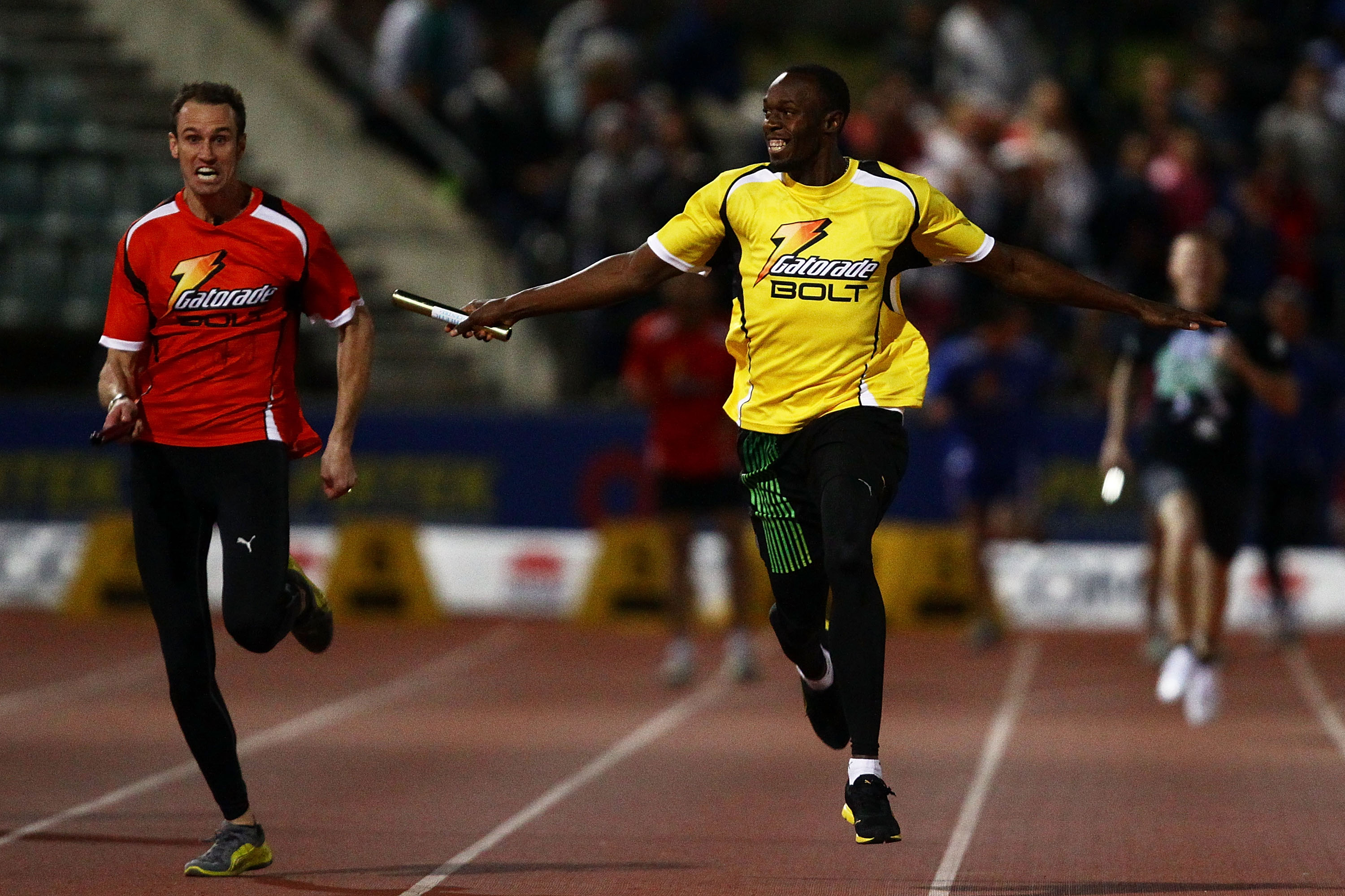 SYDNEY, AUSTRALIA - SEPTEMBER 15:  Usain Bolt (R) of Jamaica and radio personality Ryan Fitzgerald (L) run the final leg of the celebrity relay during the Athletic Allstars Meet at Sydney Olympic Park Athletic Centre on September 15, 2010 in Sydney, Austr