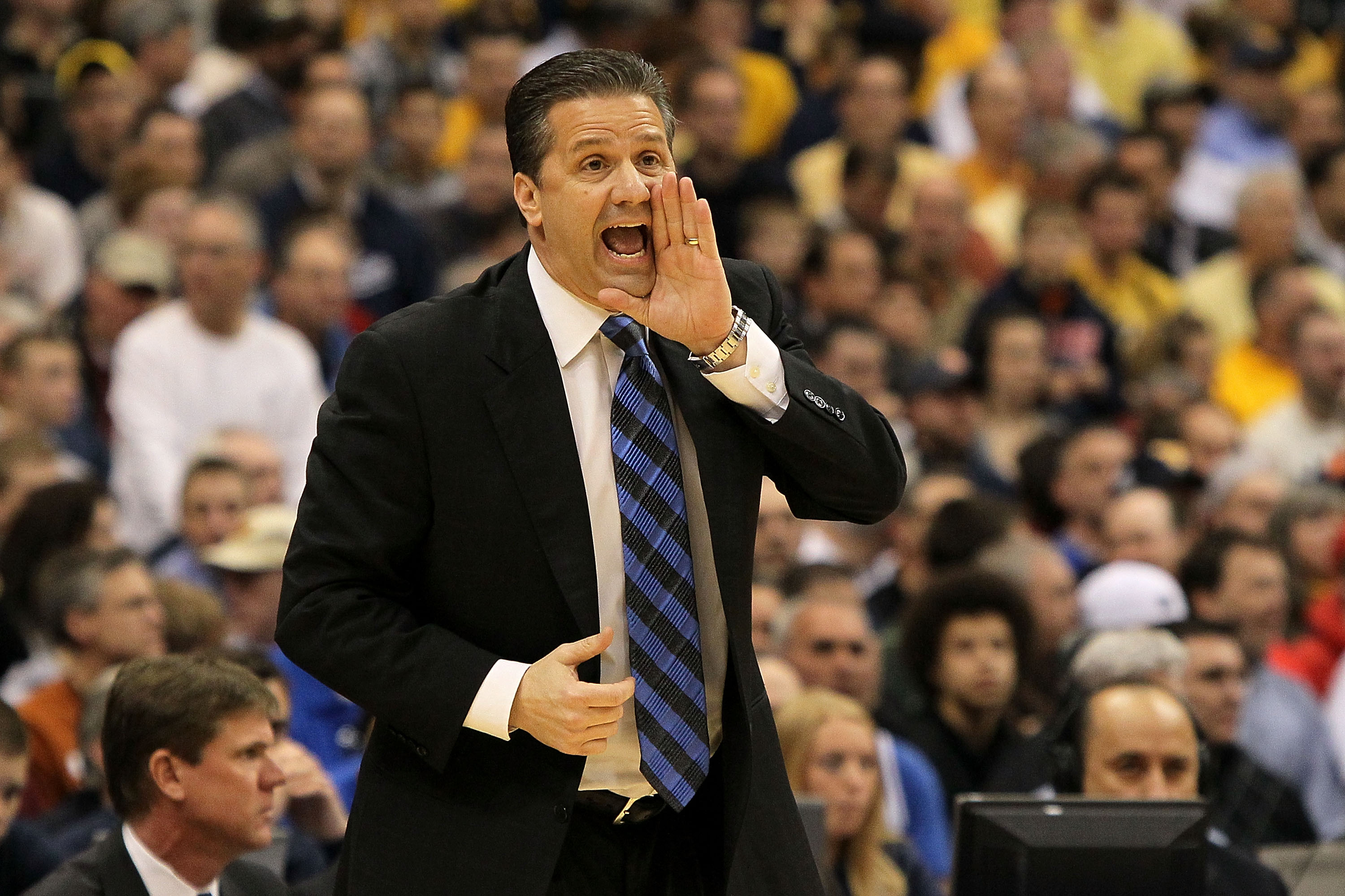 SYRACUSE, NY - MARCH 27:  Head coach John Calipari of the Kentucky Wildcats reacts against the West Virginia Mountaineers during the east regional final of the 2010 NCAA men's basketball tournament at the Carrier Dome on March 27, 2010 in Syracuse, New Yo